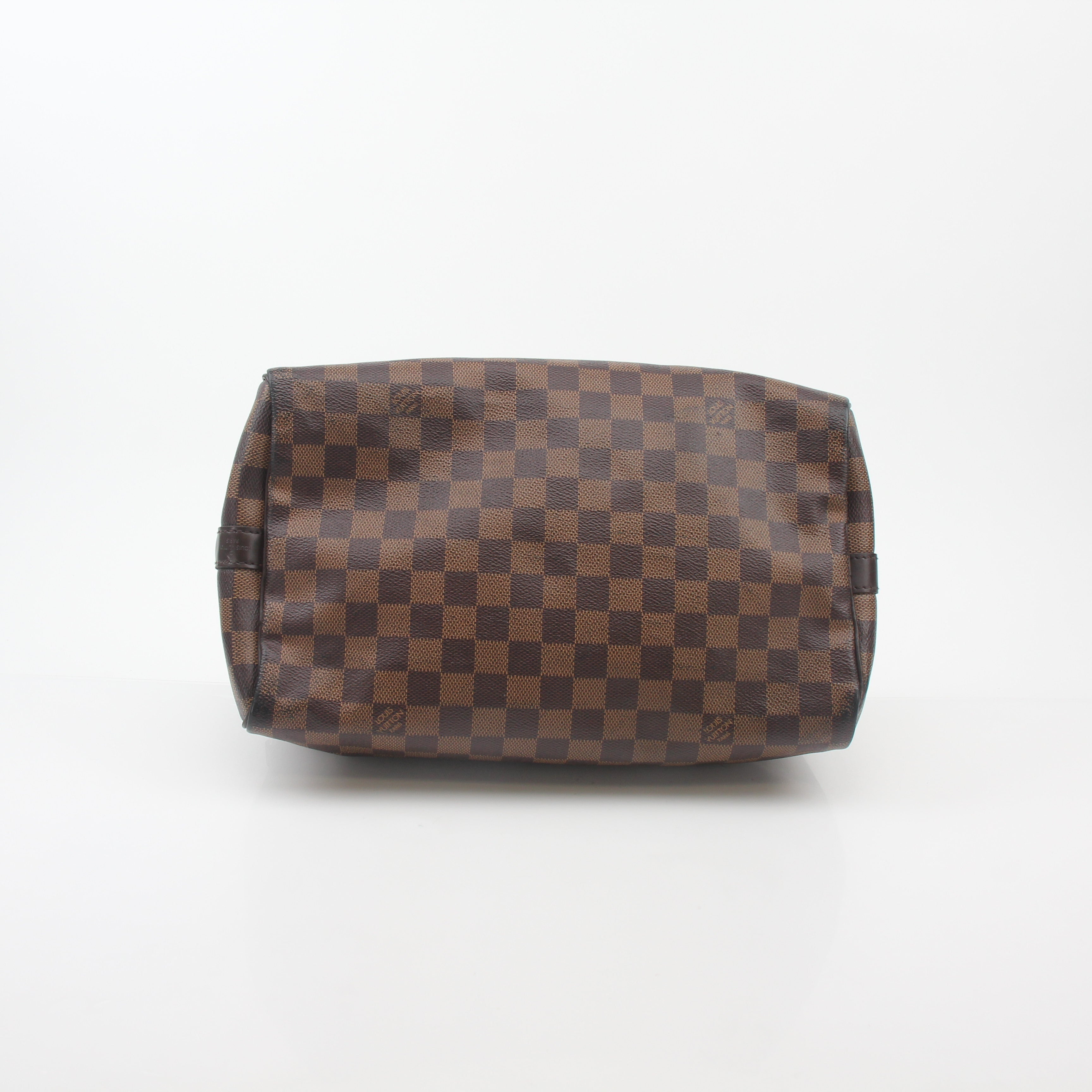Louis Vuitton Damier Ebene Speedy Bandoulière 30 handbag with leather handles and gold hardware, showcasing signature checkered pattern.
