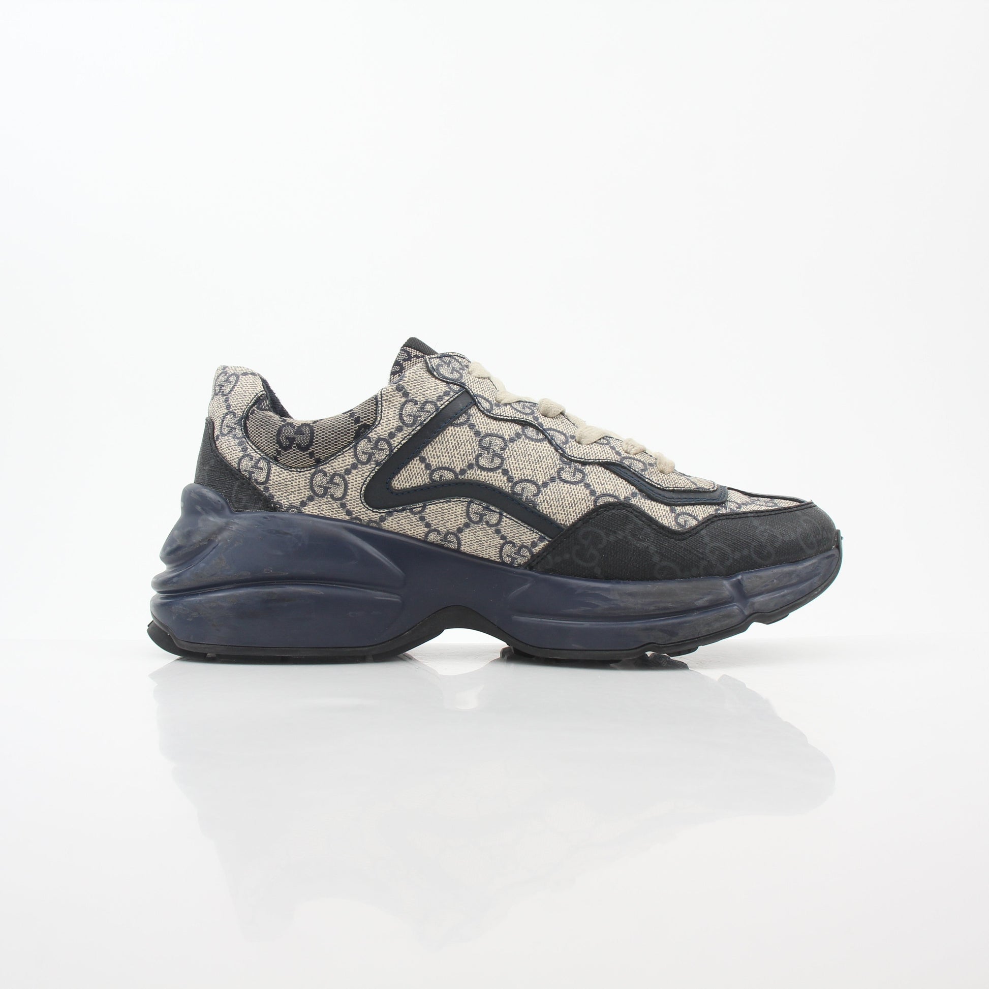 Gold & Beyond Gucci Rhyton GG Supreme Canvas Sneakers, stylish shoes with iconic canvas design and comfortable fit.