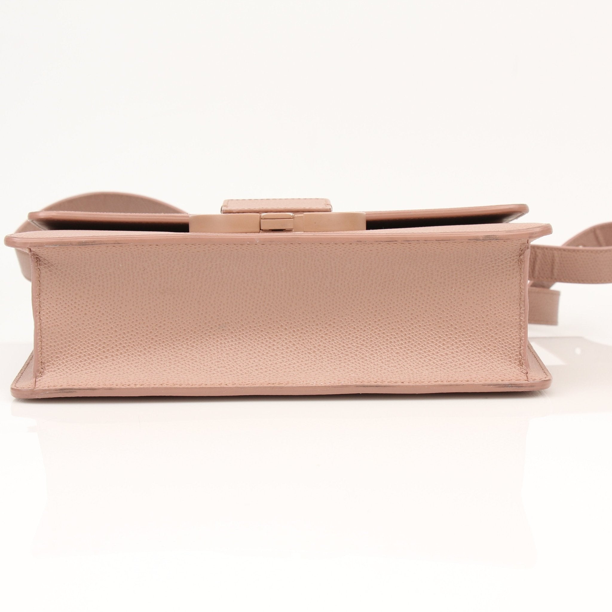 Christian Dior 30 Montaigne handbag in black leather with gold hardware, featuring a structured design and top handle.