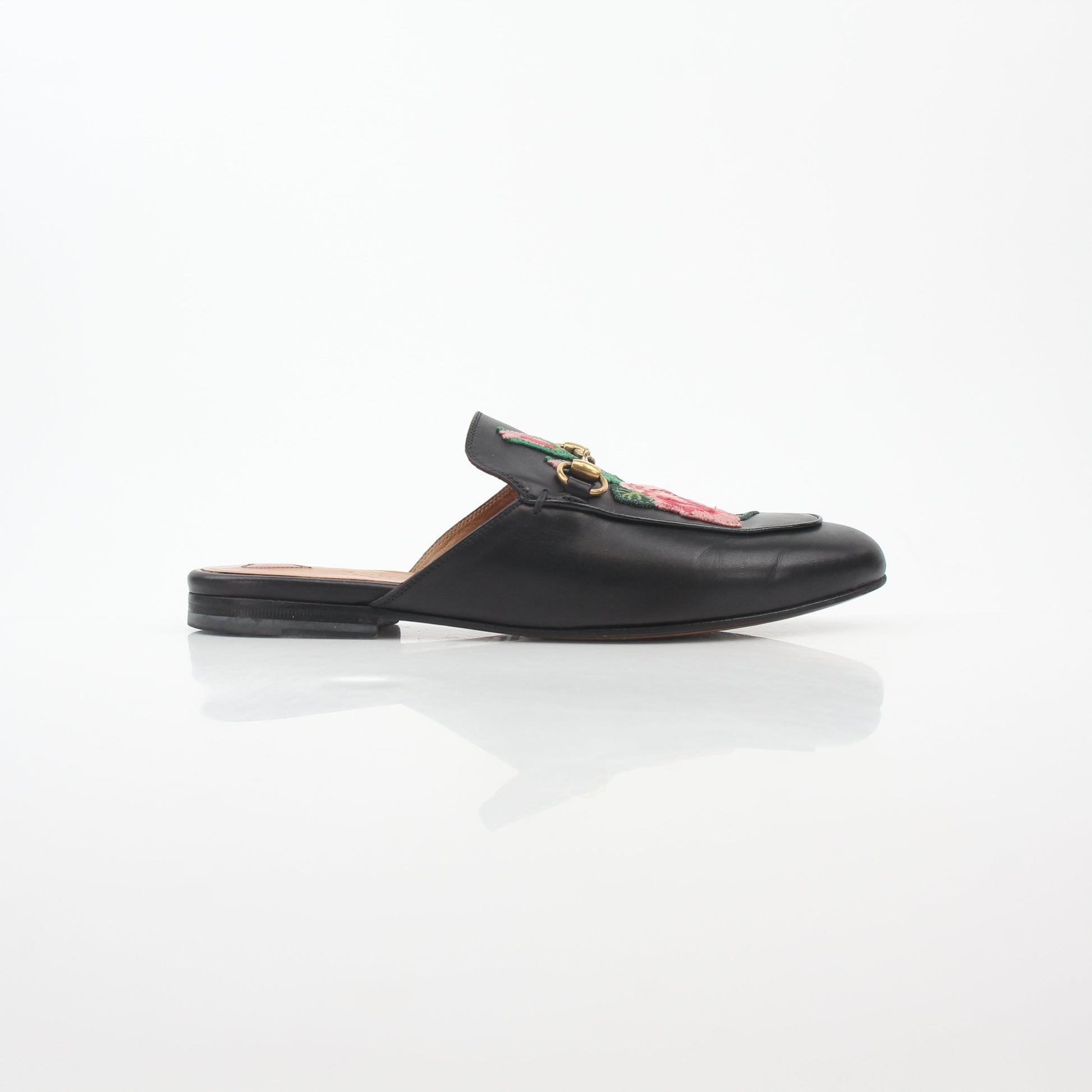Gucci black Princetown leather mule with rose embroidery, stylish slip-on shoes from Gold & Beyond.