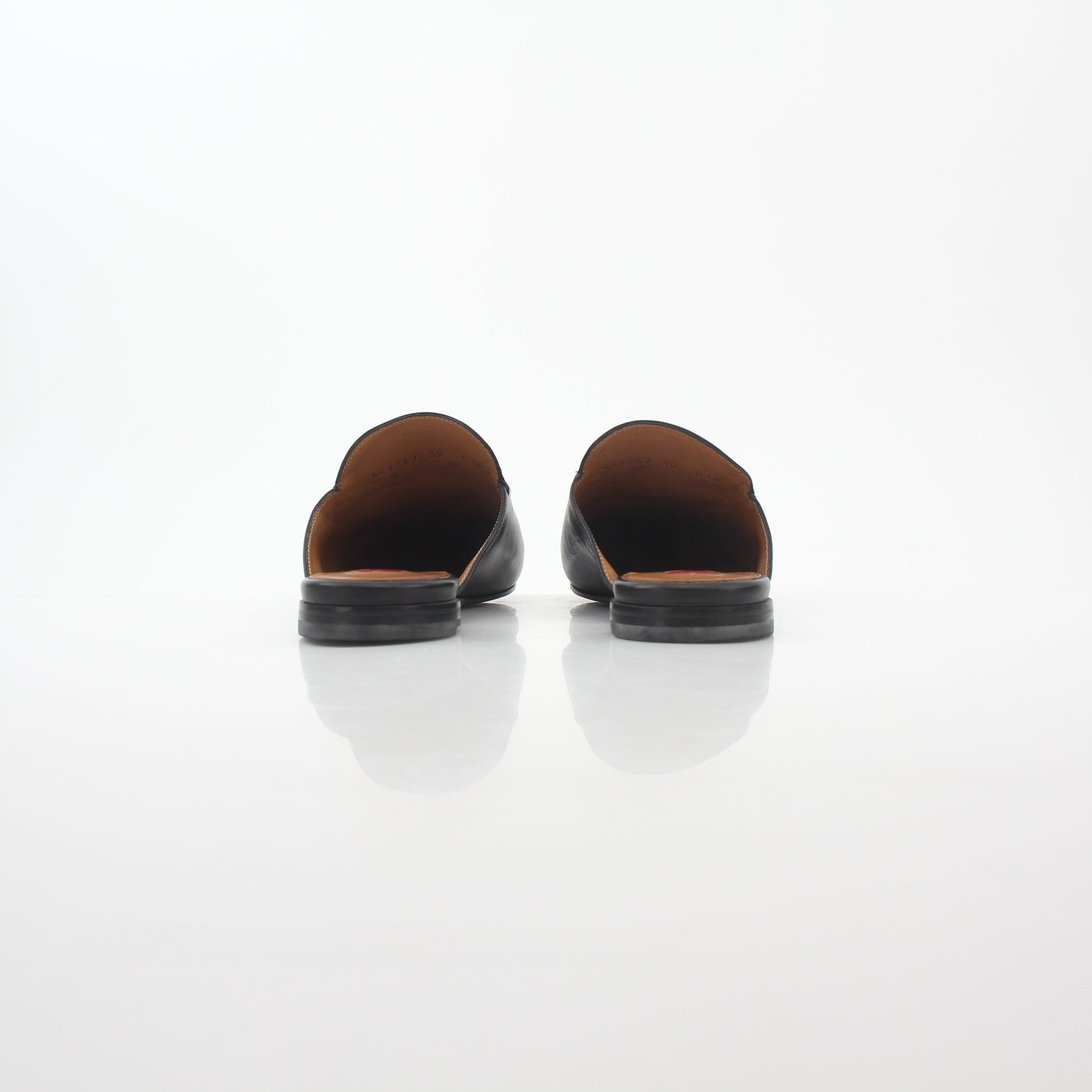 Gucci black Princetown leather mule shoes with rose embroidery, stylish slip-on footwear from Gold & Beyond.