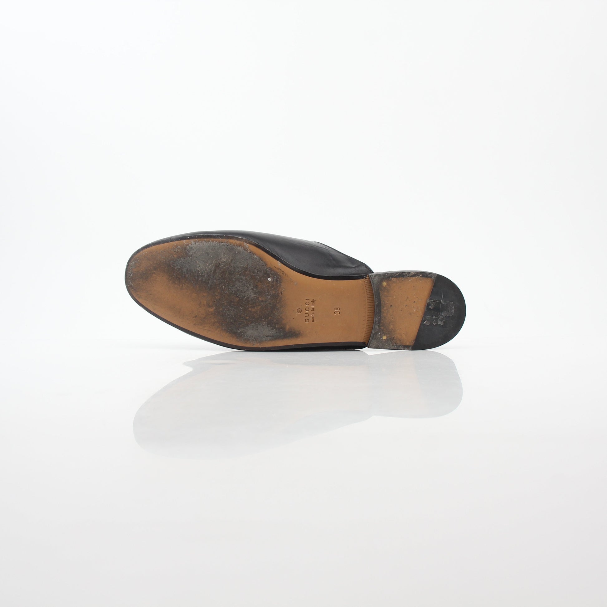 Gucci black Princetown leather mule shoes with rose embroidery, casual slip-on footwear for women.