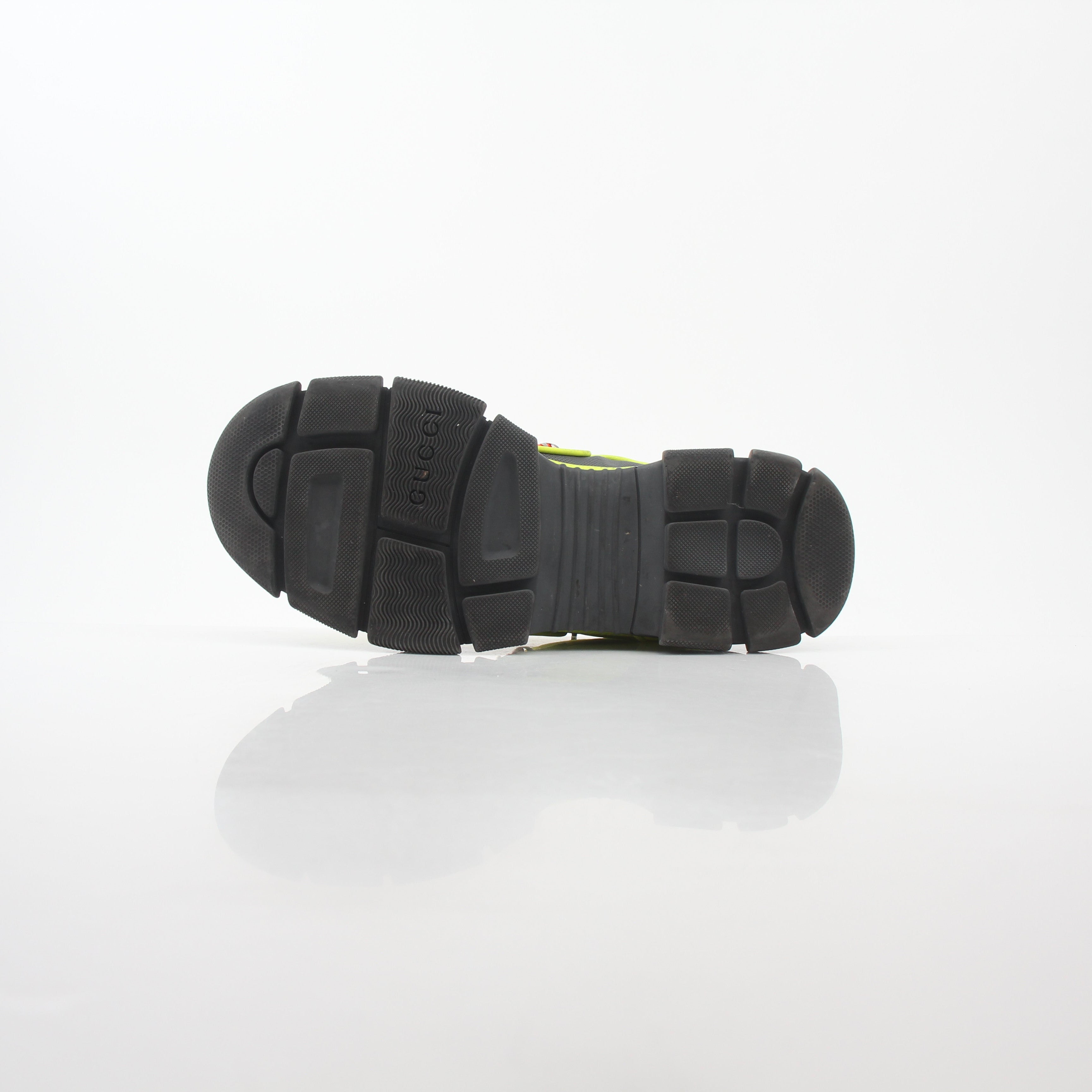 Reflective Gucci Neon Yellow Flashtrek sneakers with bold design and reflective accents, displayed on a white background.