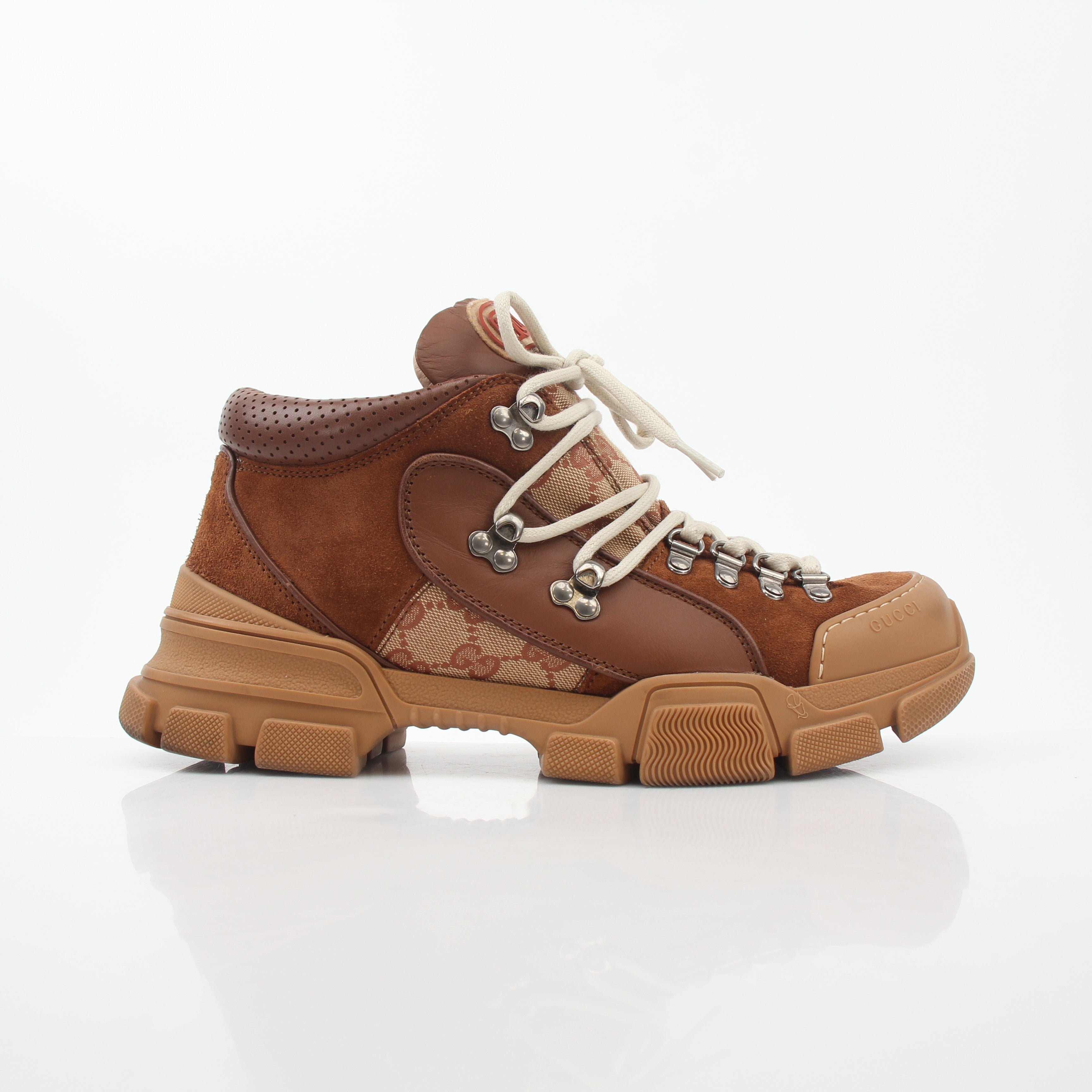 Gold & Beyond Gucci Brown GG Canvas Flashtrek Mid-Top Sneakers, stylish shoes with brown canvas and signature Gucci branding.