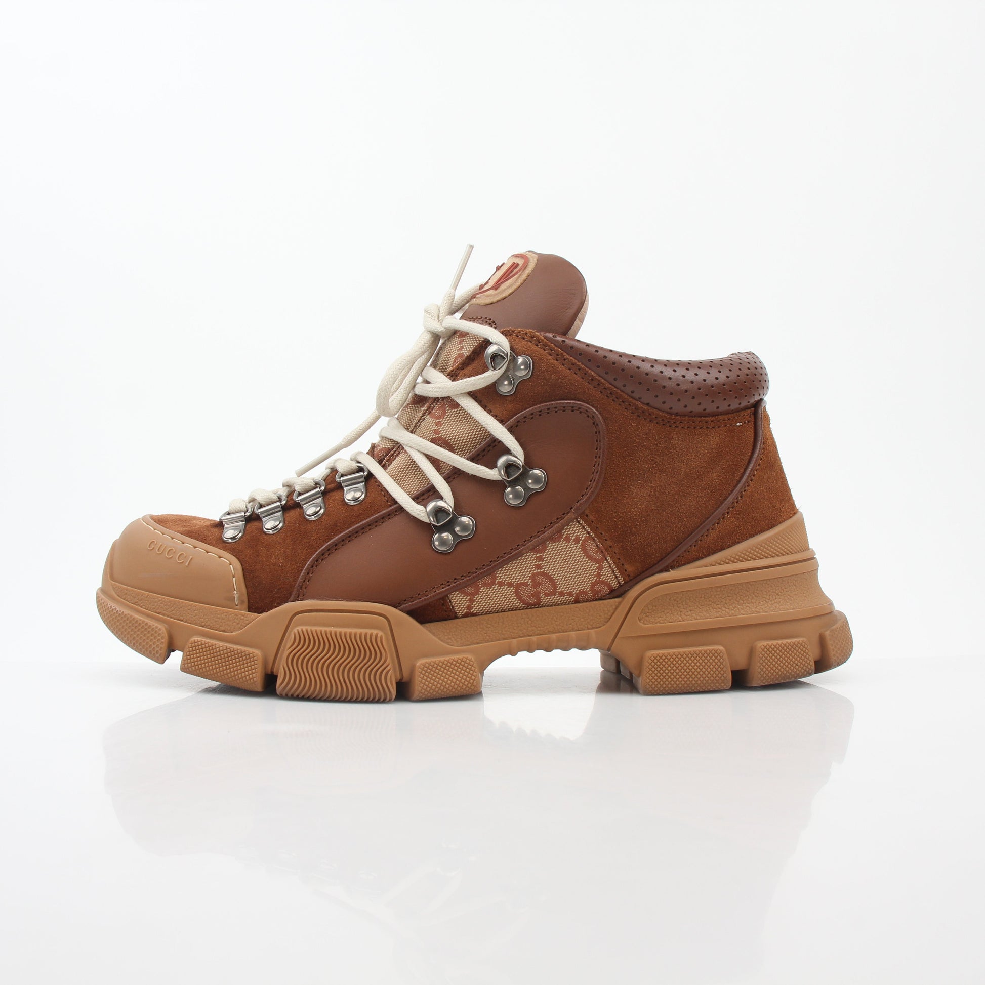 Gold & Beyond Gucci Brown GG Canvas Flashtrek mid-top sneakers with white soles and lace-up design, stylish footwear for casual wear.