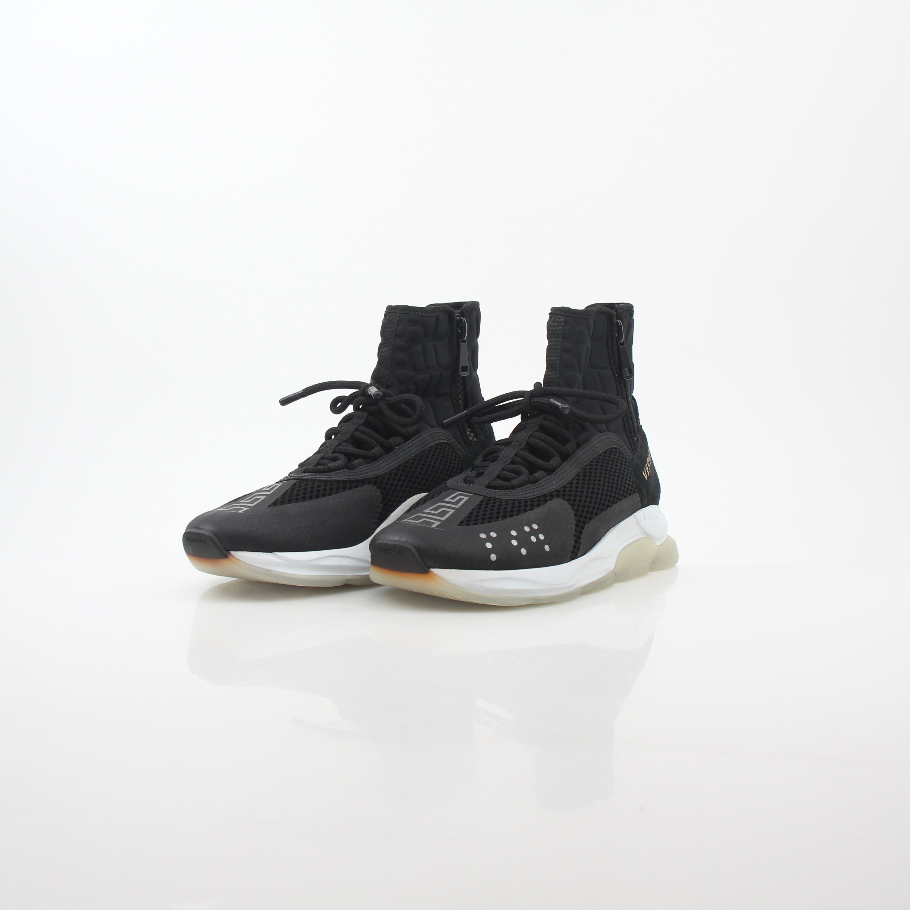 Gold & Beyond Versace Black Cross Chainer high-top sneakers with stylish design and bold cross chain detail on shoes.