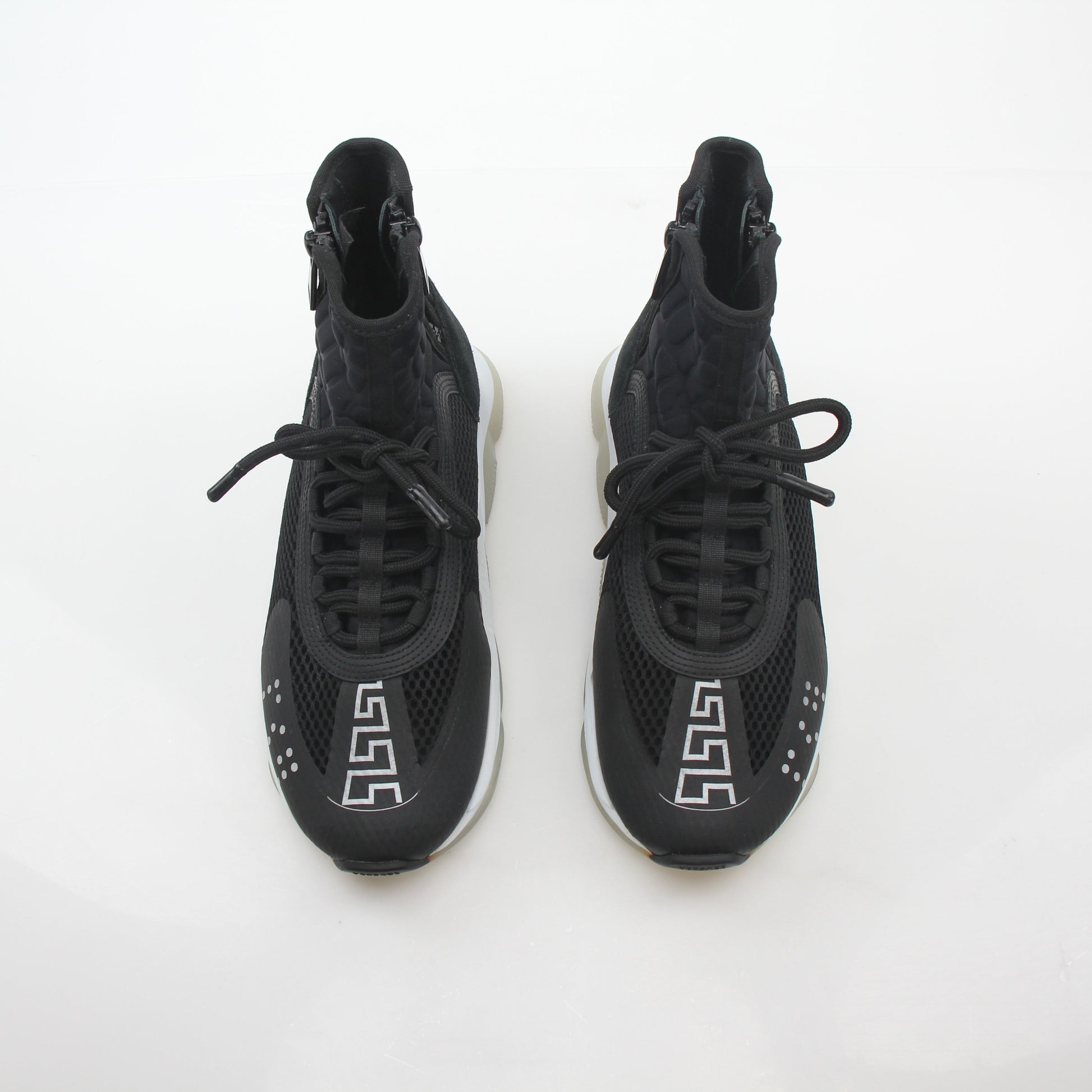 Gold & Beyond Versace black cross chainer high-top sneakers with stylish design and chunky sole.