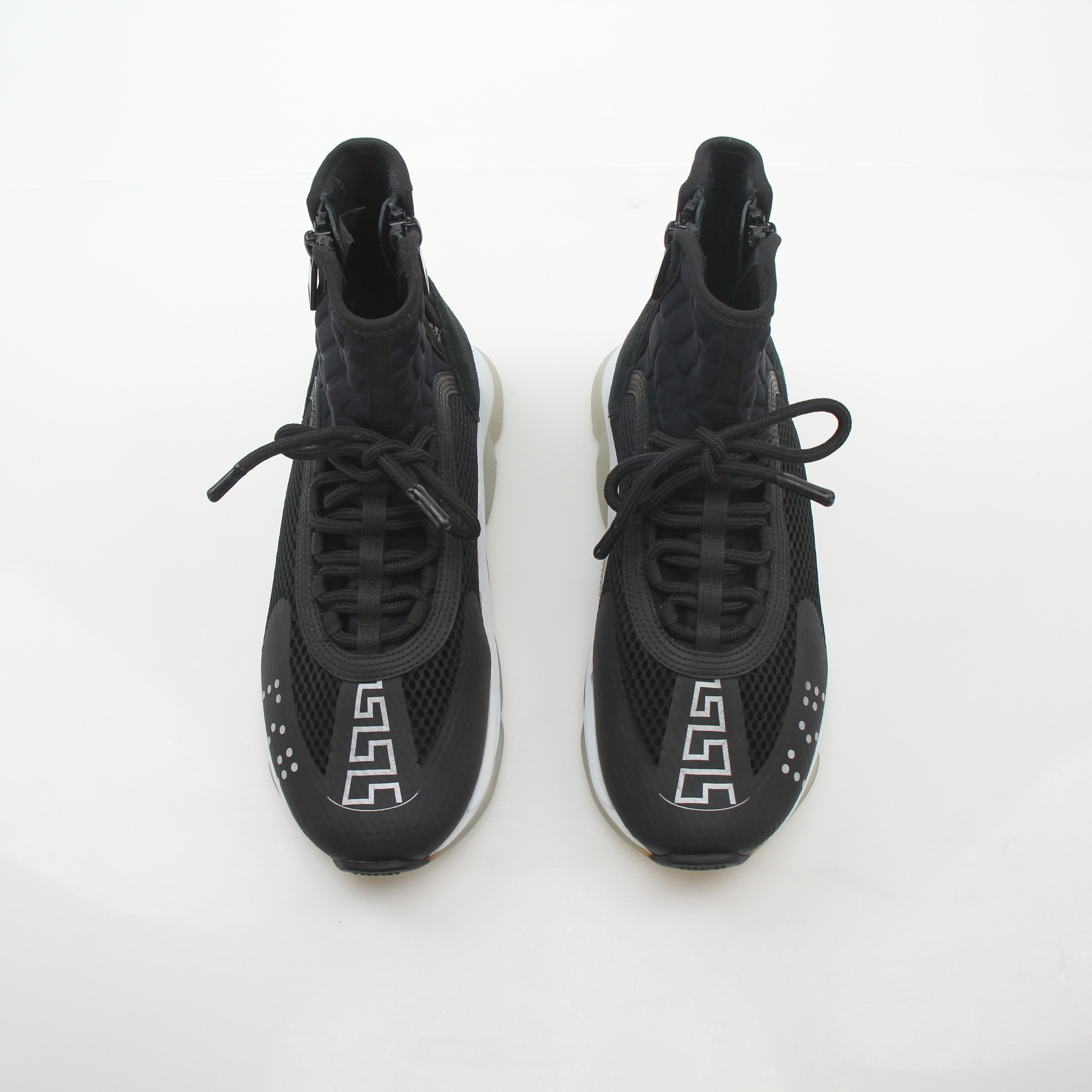Gold & Beyond Versace black cross chainer high-top sneakers with stylish design and chunky sole.