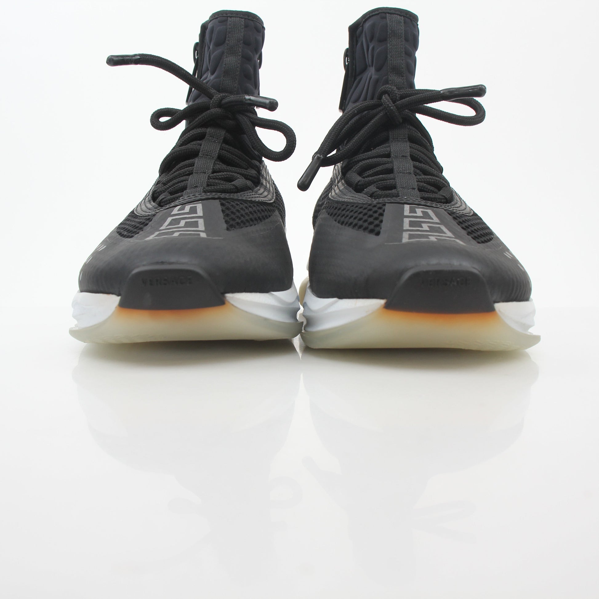 Versace Black Cross Chainer high-top sneakers by Gold & Beyond, featuring a sleek design with chain accents and stylish high-top shoes.