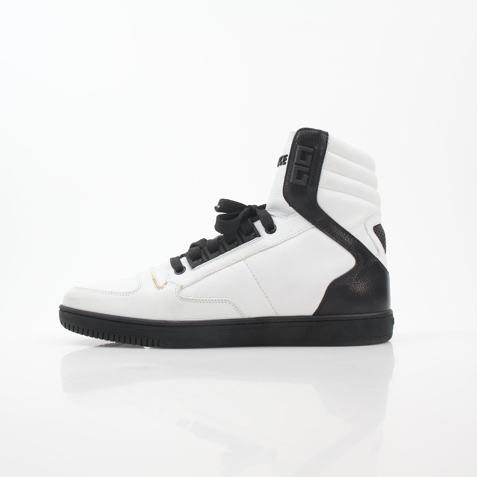 Gold & Beyond Versace White and Black Greca Key high-top sneakers with bold pattern, textured soles, and branded details.