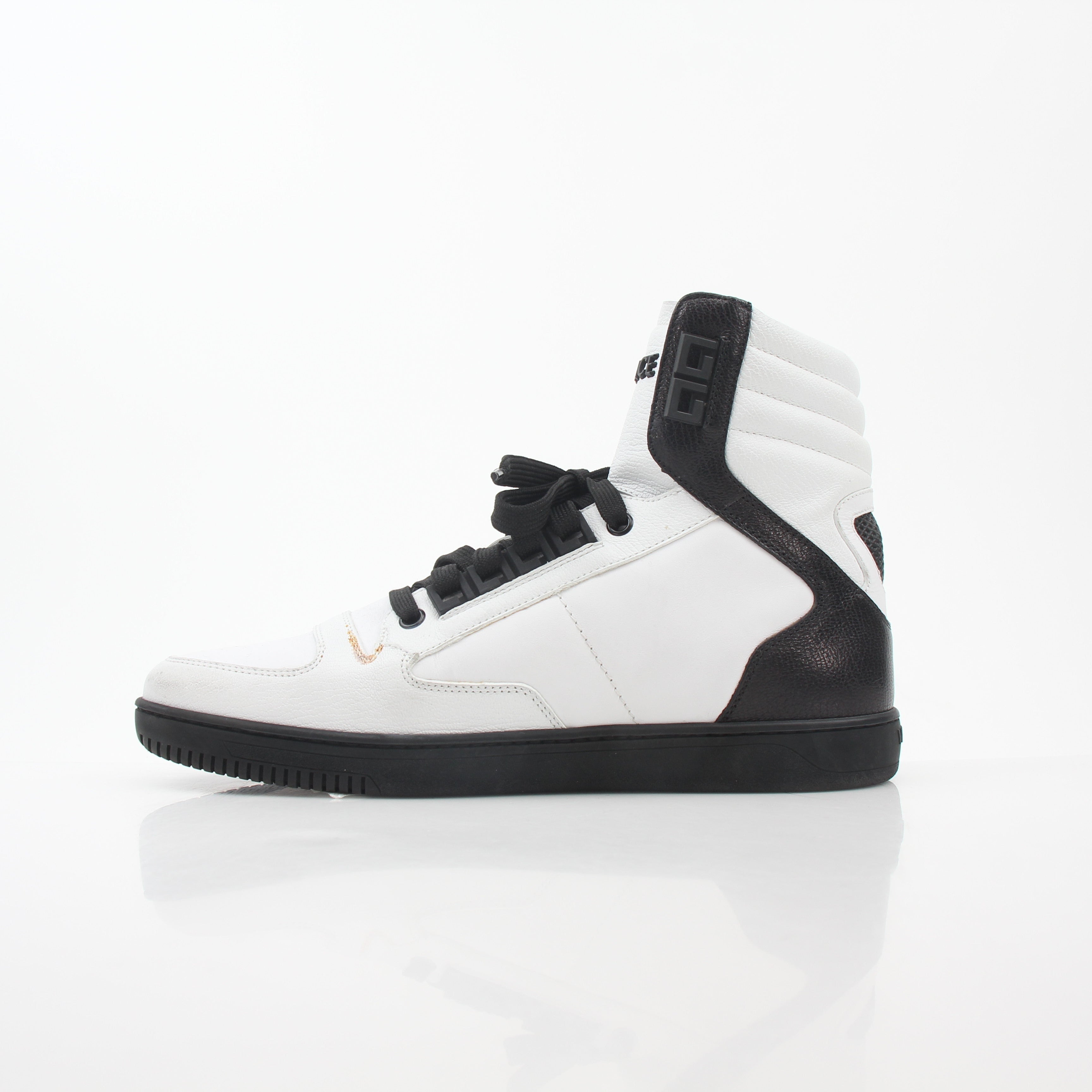 Gold & Beyond Versace White and Black Greca Key high-top sneakers with bold pattern, textured soles, and branded details.