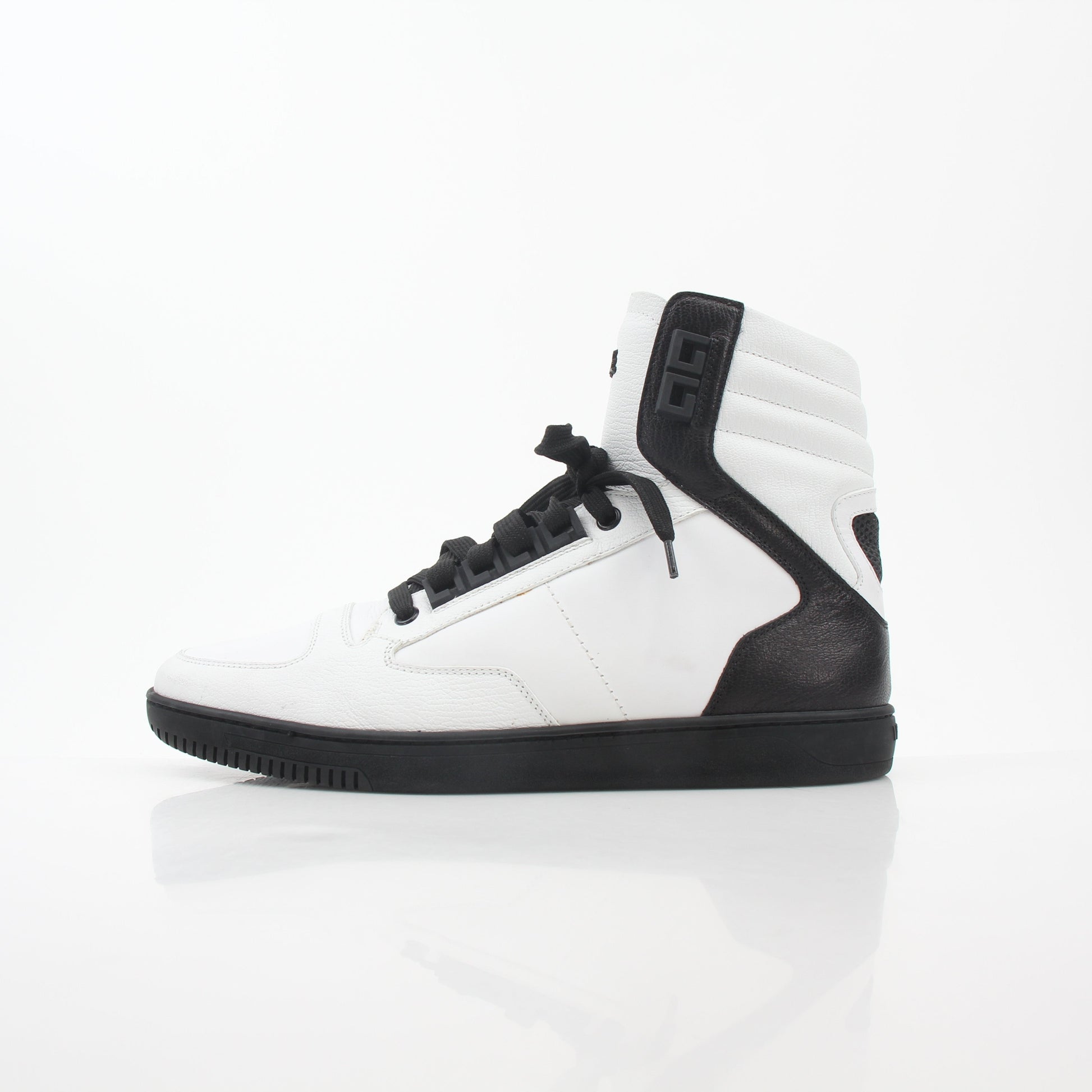 Gold & Beyond Versace white and black Greca Key high-top sneakers featuring bold design and iconic Greek key pattern.