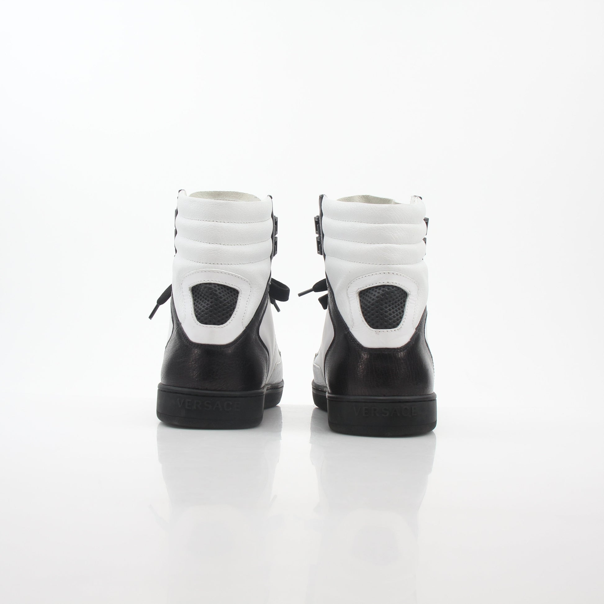 Gold & Beyond Versace White and Black Greca Key high-top sneakers with bold pattern and stylish design.