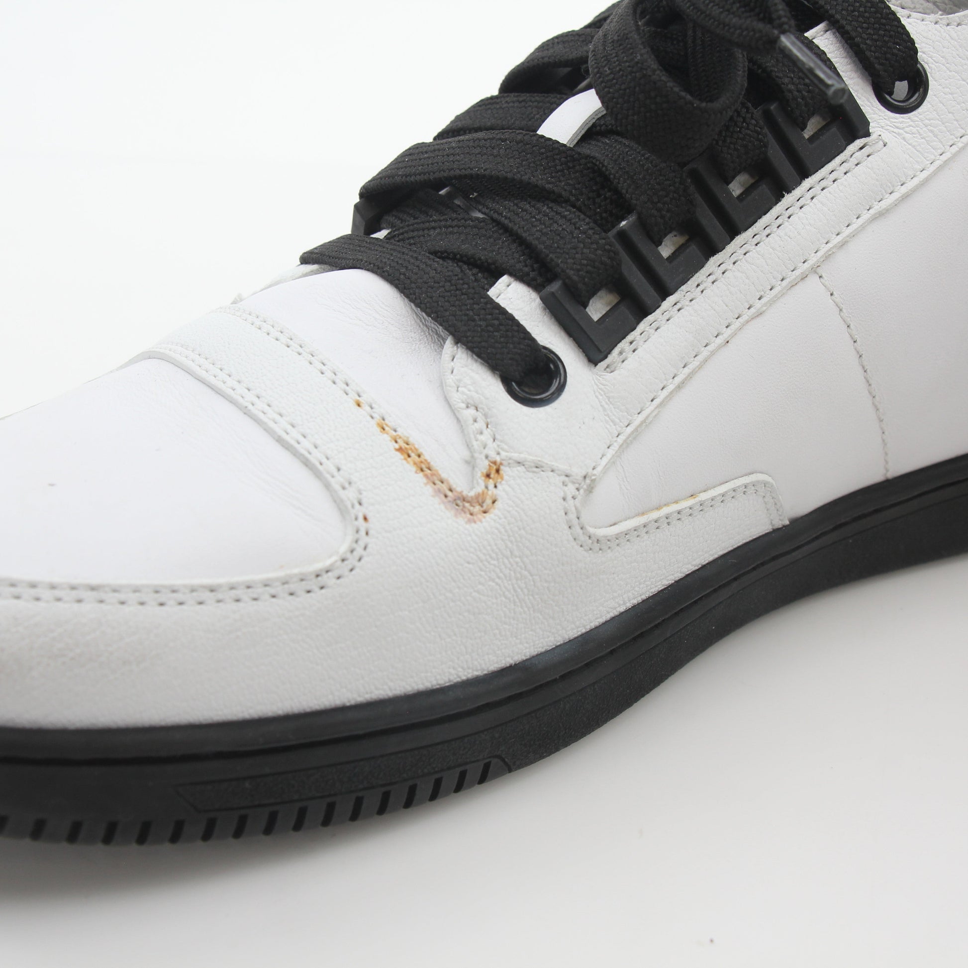 Gold & Beyond Versace White and Black Greca Key high-top sneakers with logo details and stylish design on a clean background.