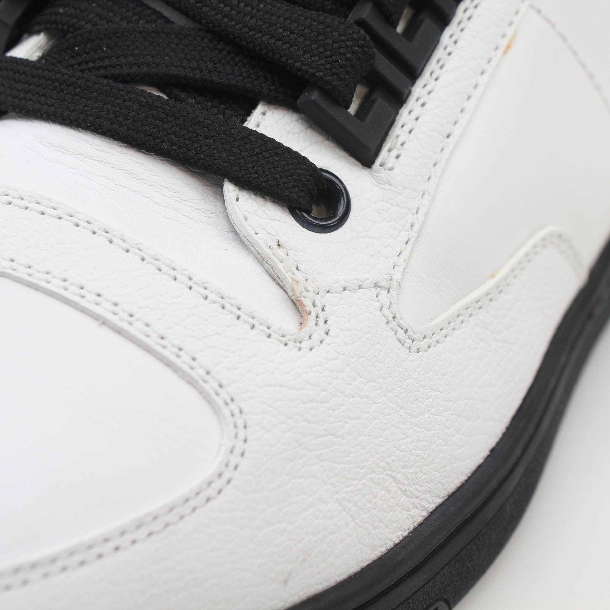 Gold & Beyond Versace White and Black Greca Key high-top sneakers with stylish design and signature pattern.
