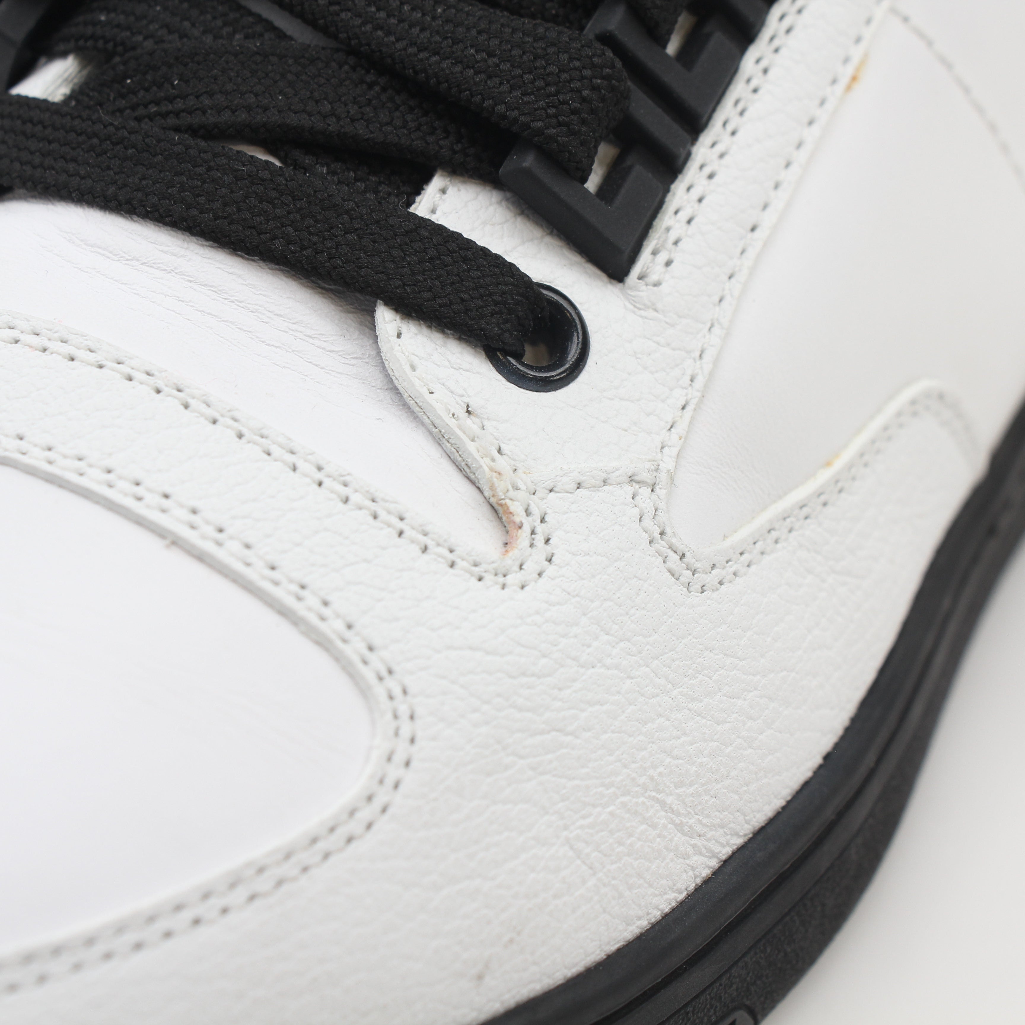 Gold & Beyond Versace White and Black Greca Key high-top sneakers with stylish design and signature pattern.