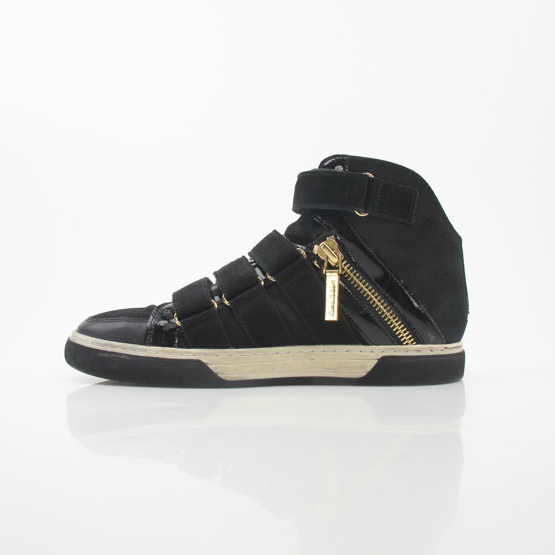 Pierre Balmain black multi-strap high-top sneakers with gold accents, featuring a stylish shoe design and high-top silhouette.
