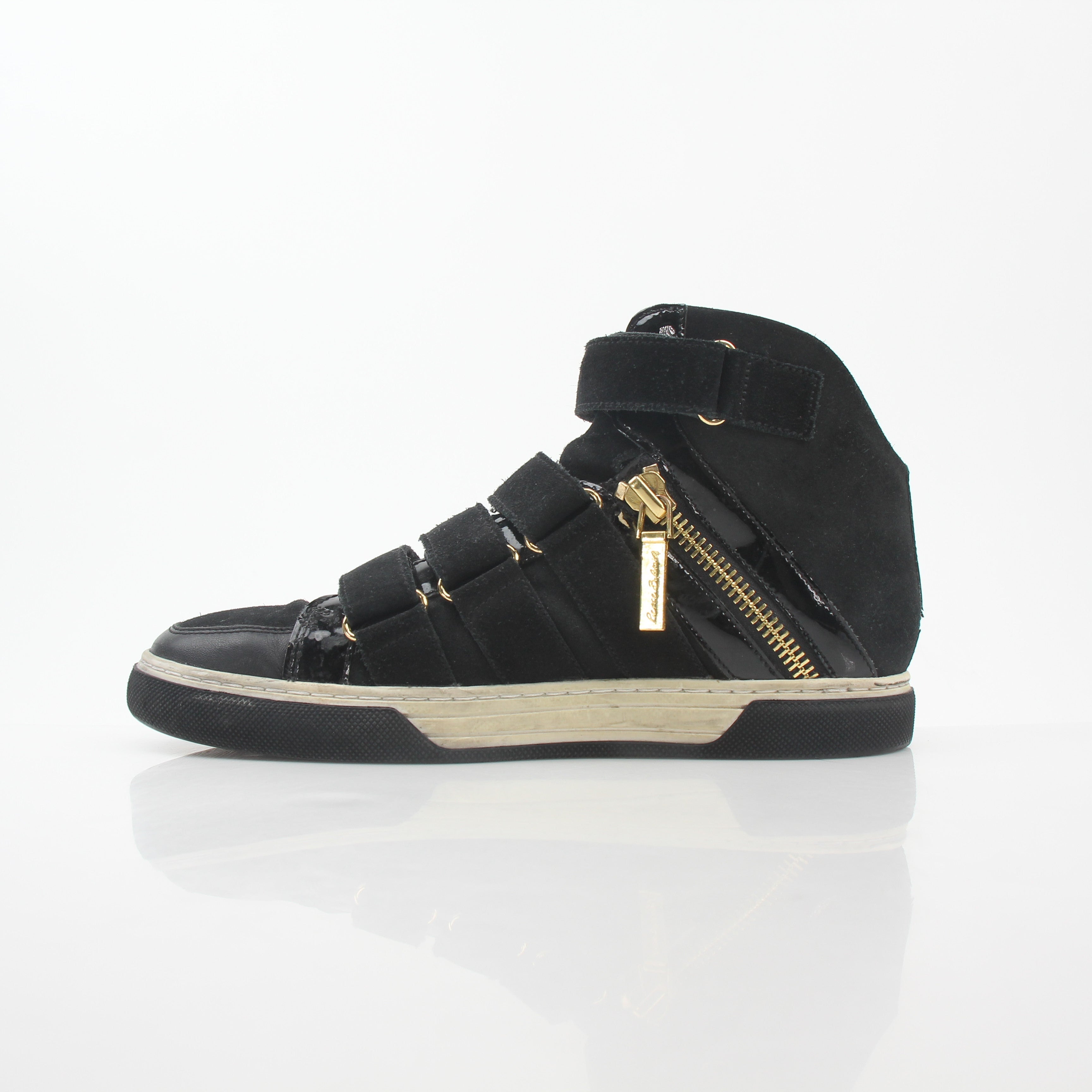 Pierre Balmain black multi-strap high-top sneakers with gold accents, featuring a stylish shoe design and high-top silhouette.