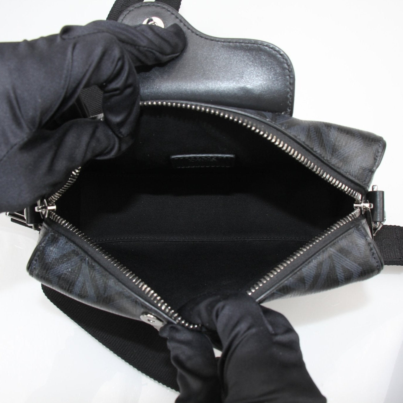 Christian Dior Lignot 22 handbag in gold with quilted leather and chain strap, stylishly displayed on a neutral background.