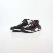 Adidas x Pharrell Williams NMD Hu Trail Holi Equality sneakers in vibrant colors, displayed on a white background.