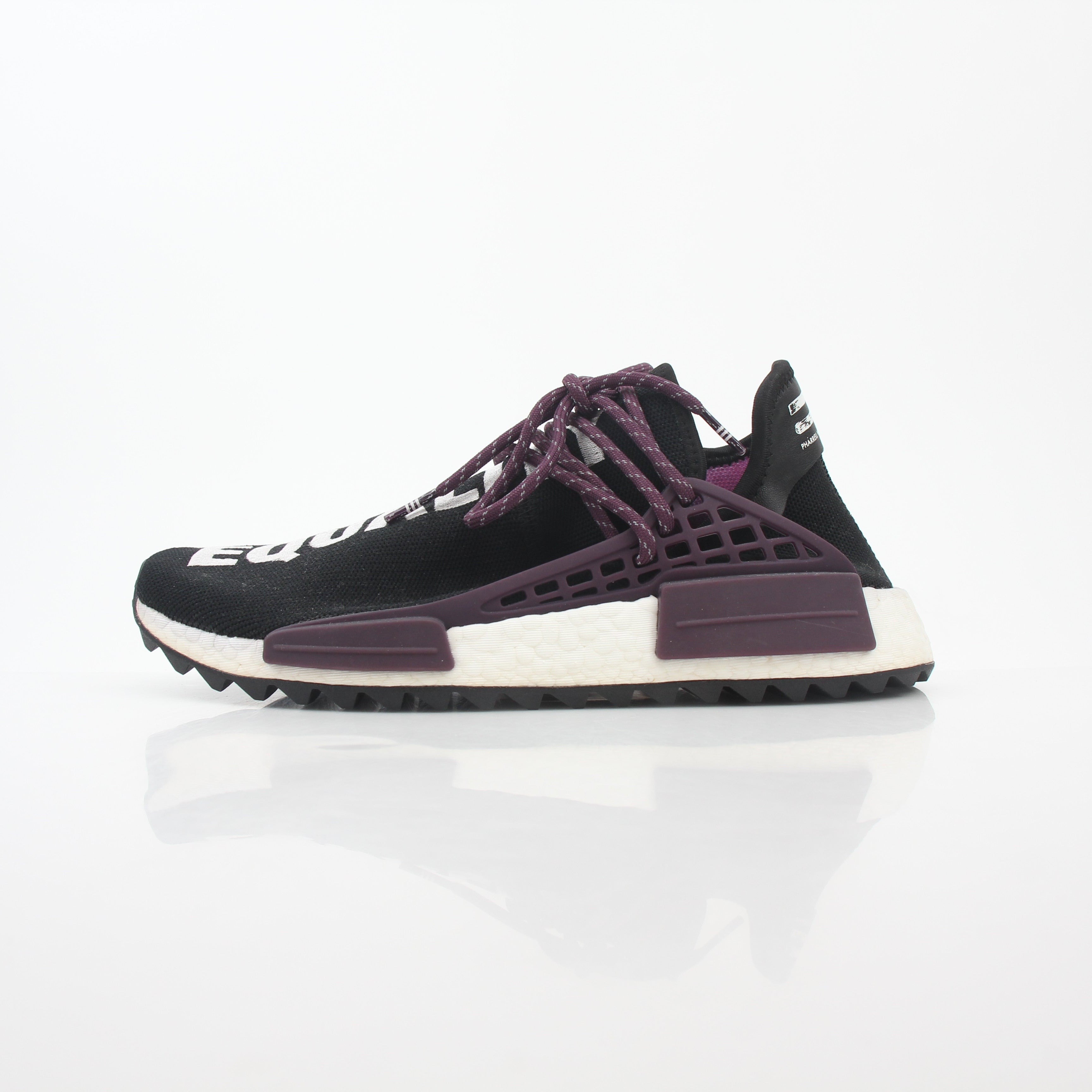 Adidas x Pharrell Williams NMD Hu Trail Holi Equality sneakers in vibrant colors on a white background.