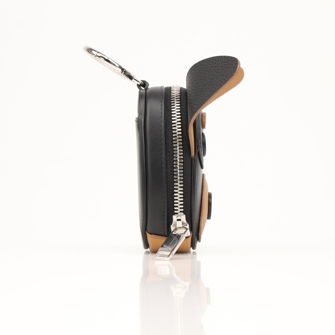 Christian Dior Mini Bobby Dog Zip Wallet Pouch in gold, featuring a compact design and zip closure, displayed on a white background.