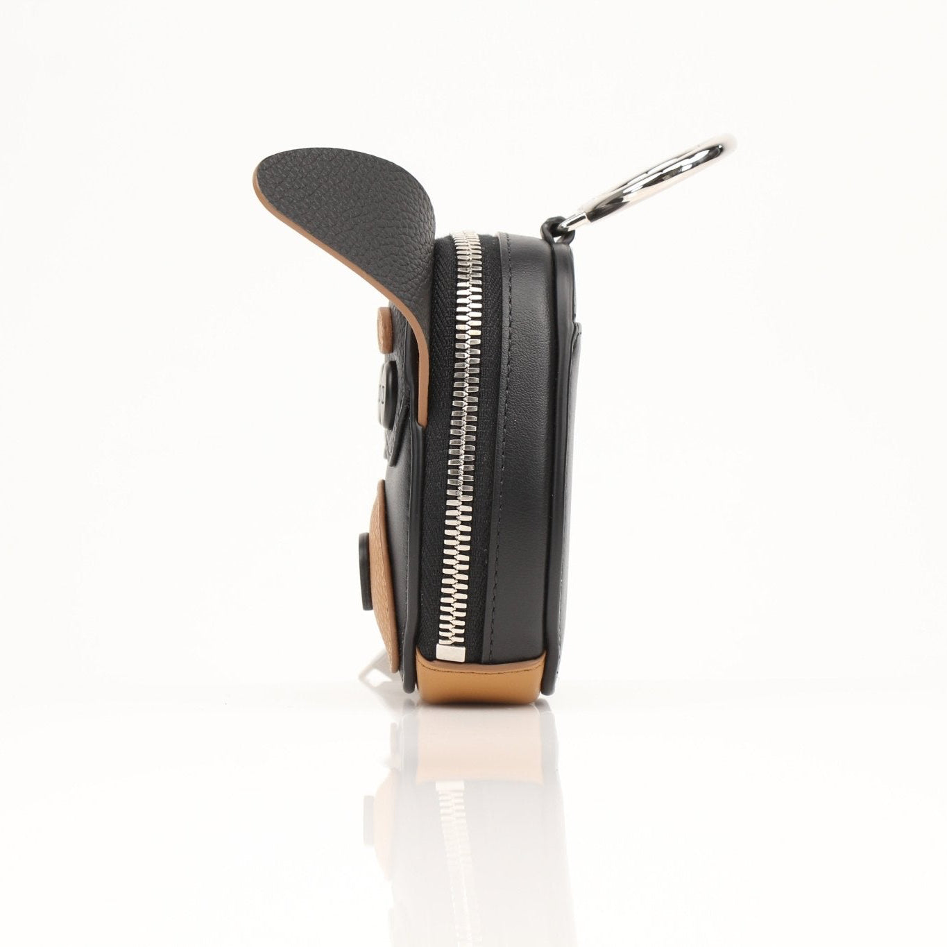 Christian Dior Mini Bobby Dog zip wallet pouch with gold accents, compact leather wallet featuring a playful dog design.