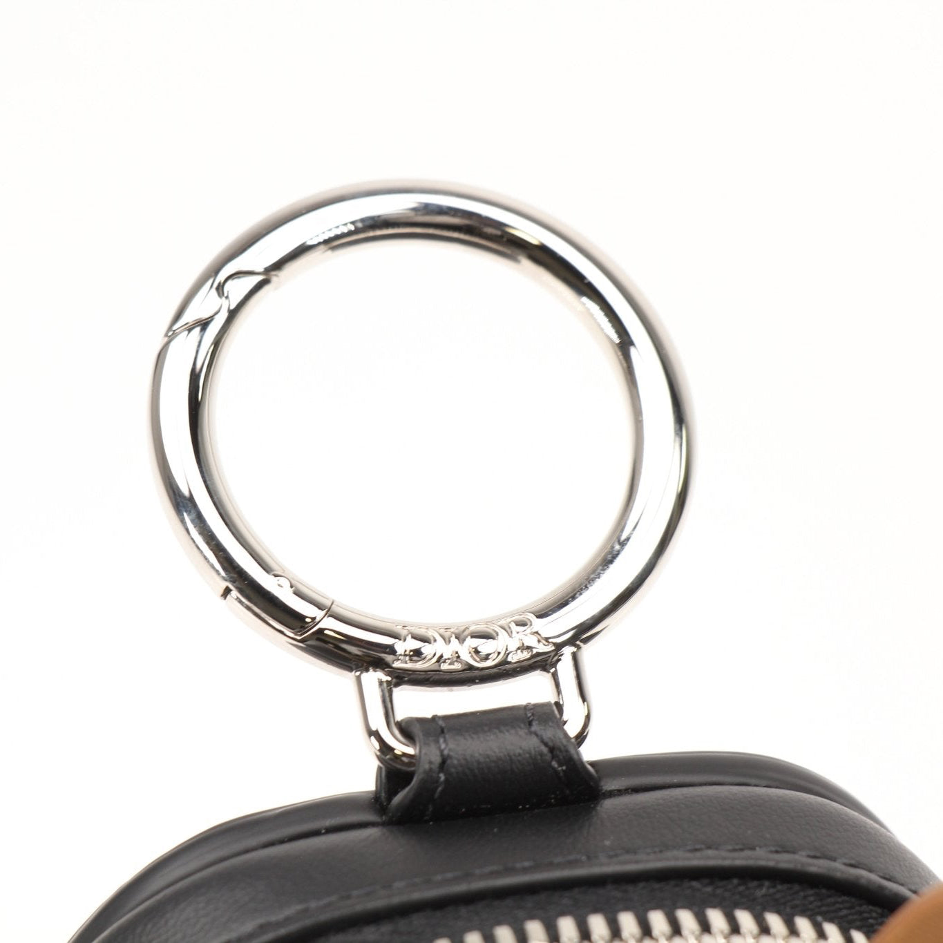 Christian Dior Mini Bobby Dog Zip Wallet Pouch with gold accents, compact leather wallet featuring a playful dog design.