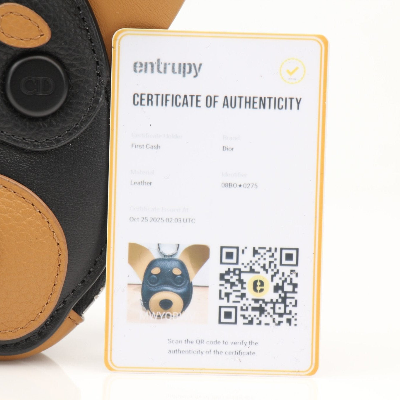 Christian Dior Mini Bobby Dog Zip Wallet Pouch with gold accents, compact leather wallet featuring a playful dog design.