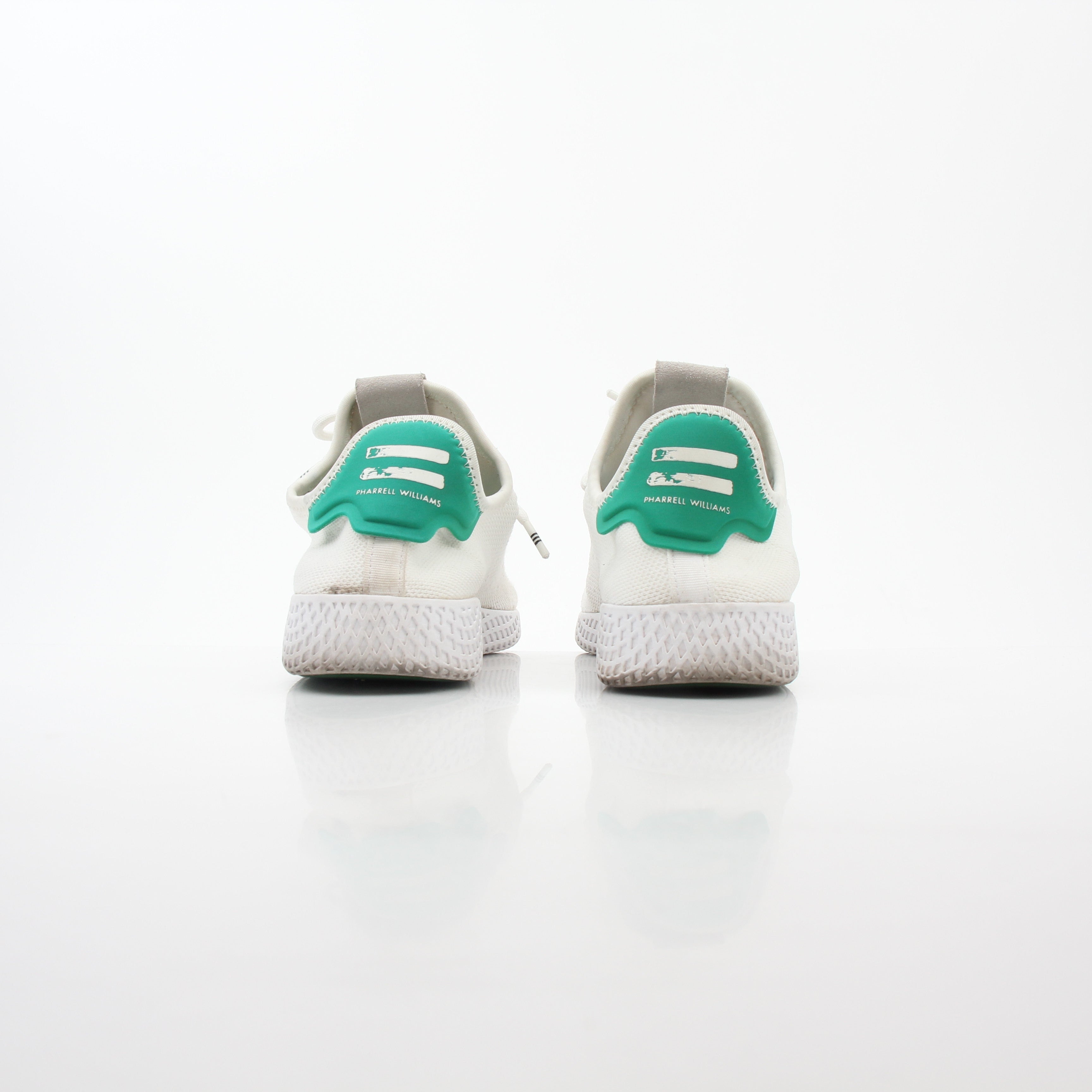Adidas x Pharrell Williams Tennis Hu white and green sneakers with sleek design and sporty style.