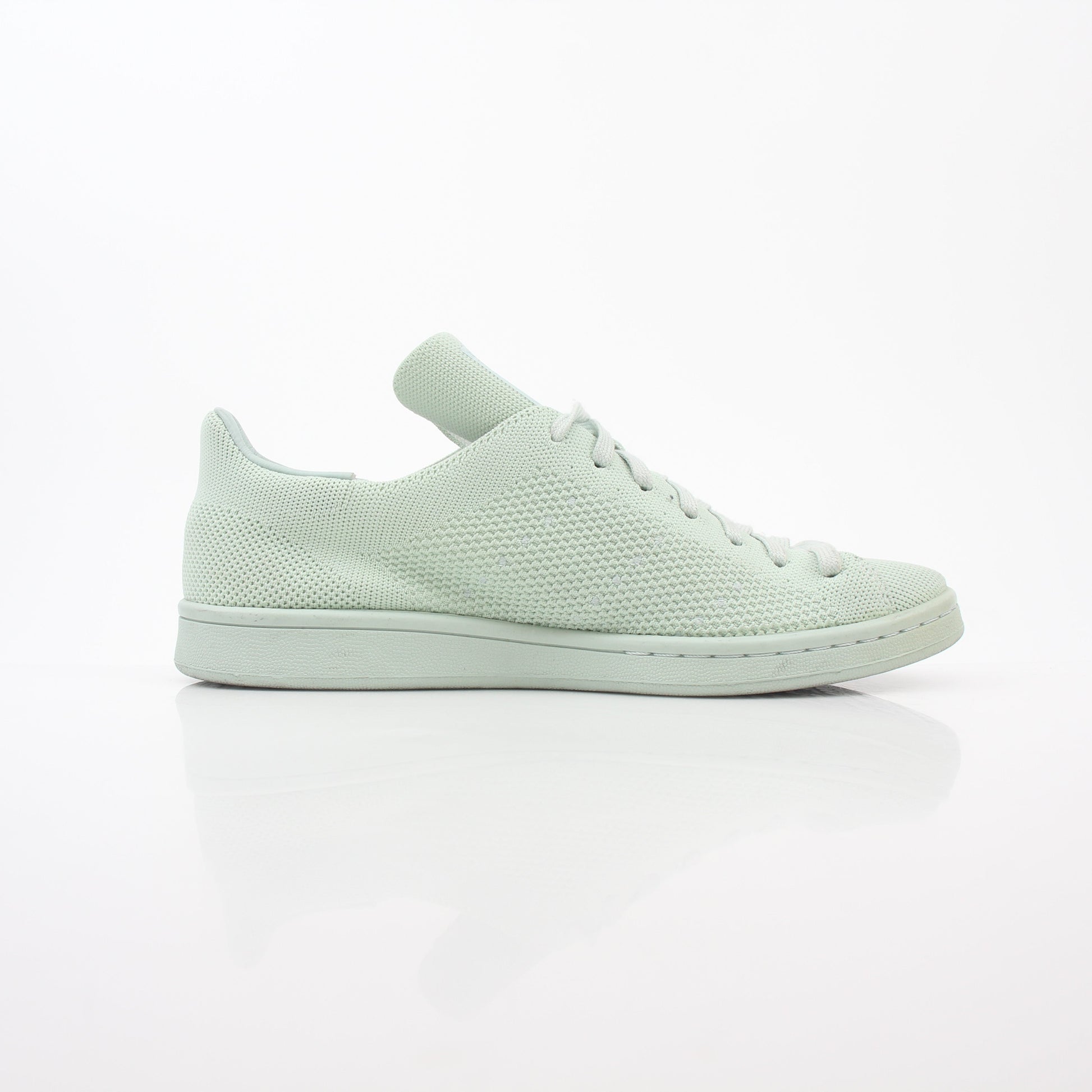 Gold & Beyond Adidas Stan Smith Primeknit Vapour Green sneakers, white shoes with green accents, and classic design.