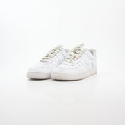 Nike White Air Force 1 ’07 Low sneakers in white leather with Nike branding and low-top design, displayed on a plain background.