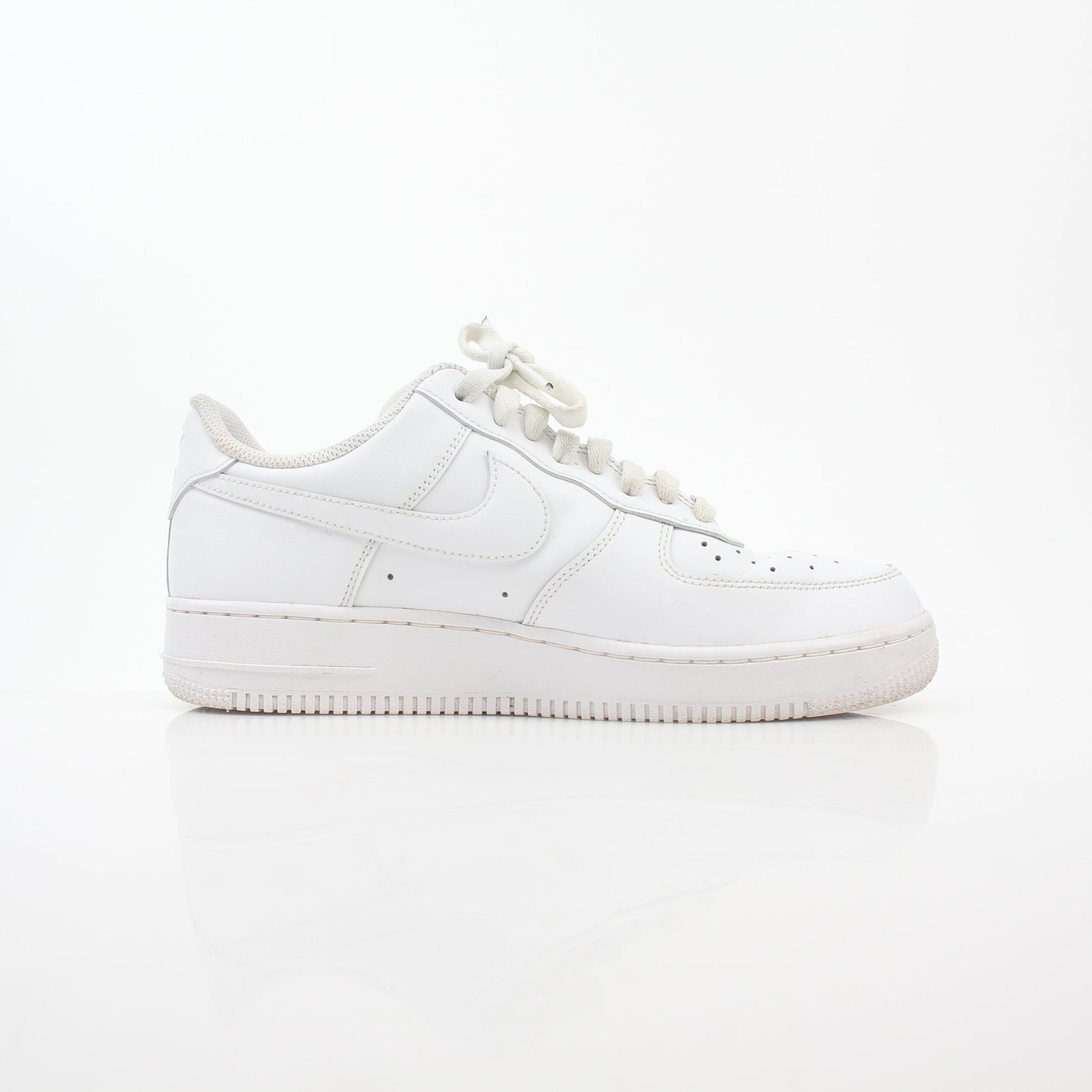 Nike White Air Force 1 ’07 Low sneakers by Gold & Beyond, showcasing classic low-top design with white leather uppers and Nike branding.