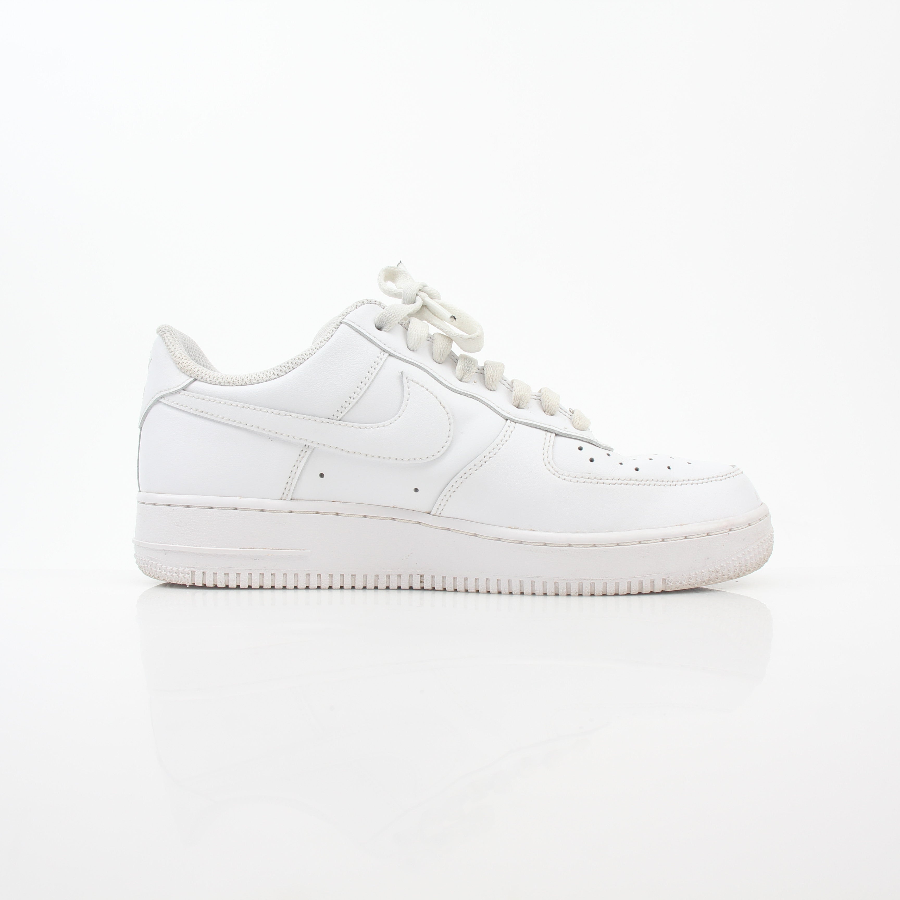 Nike White Air Force 1 ’07 Low sneakers by Gold & Beyond, showcasing classic low-top design with white leather uppers and Nike branding.