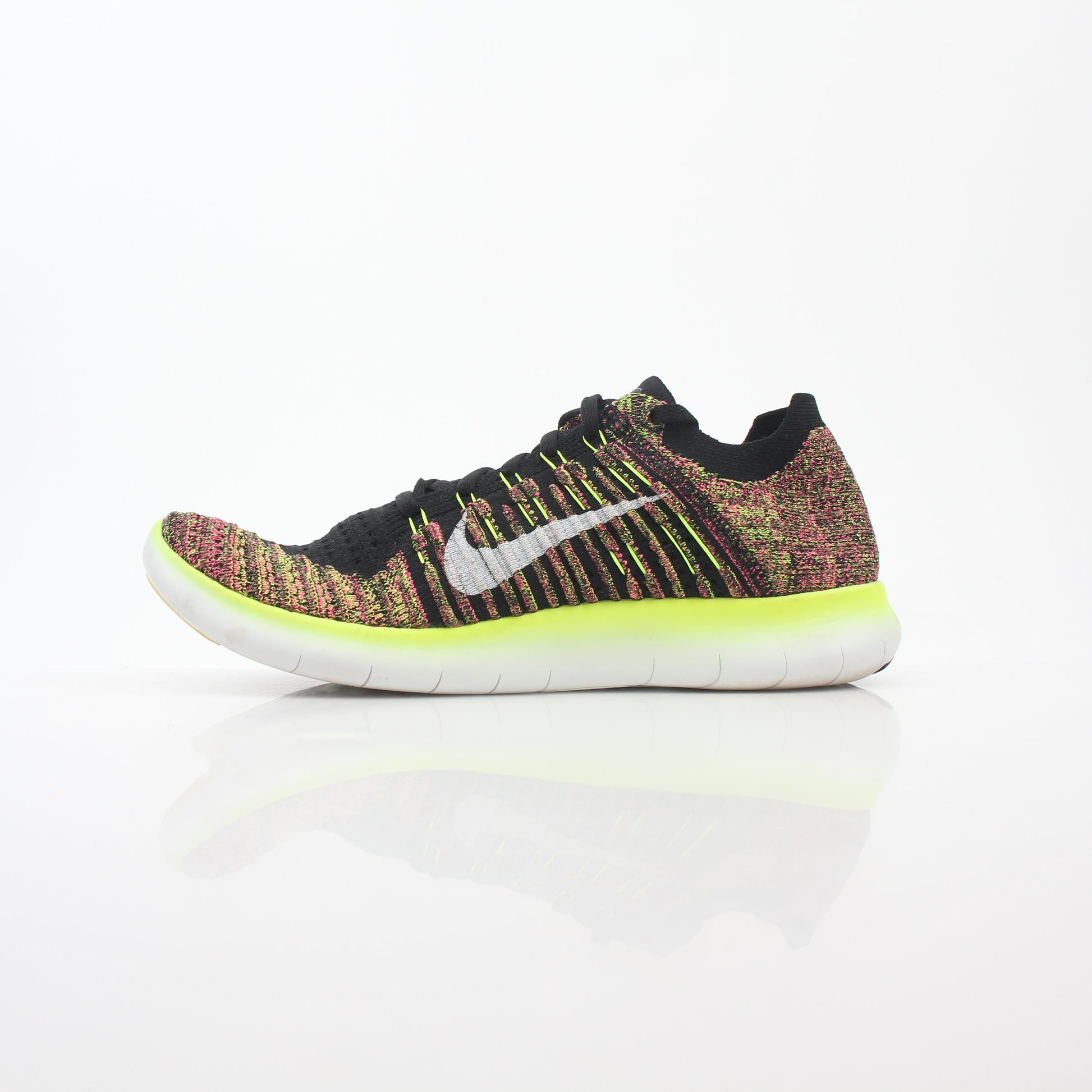 Nike Free RN Flyknit Unlimited multicolor sneakers, lightweight athletic shoes with breathable Flyknit upper and flexible sole.