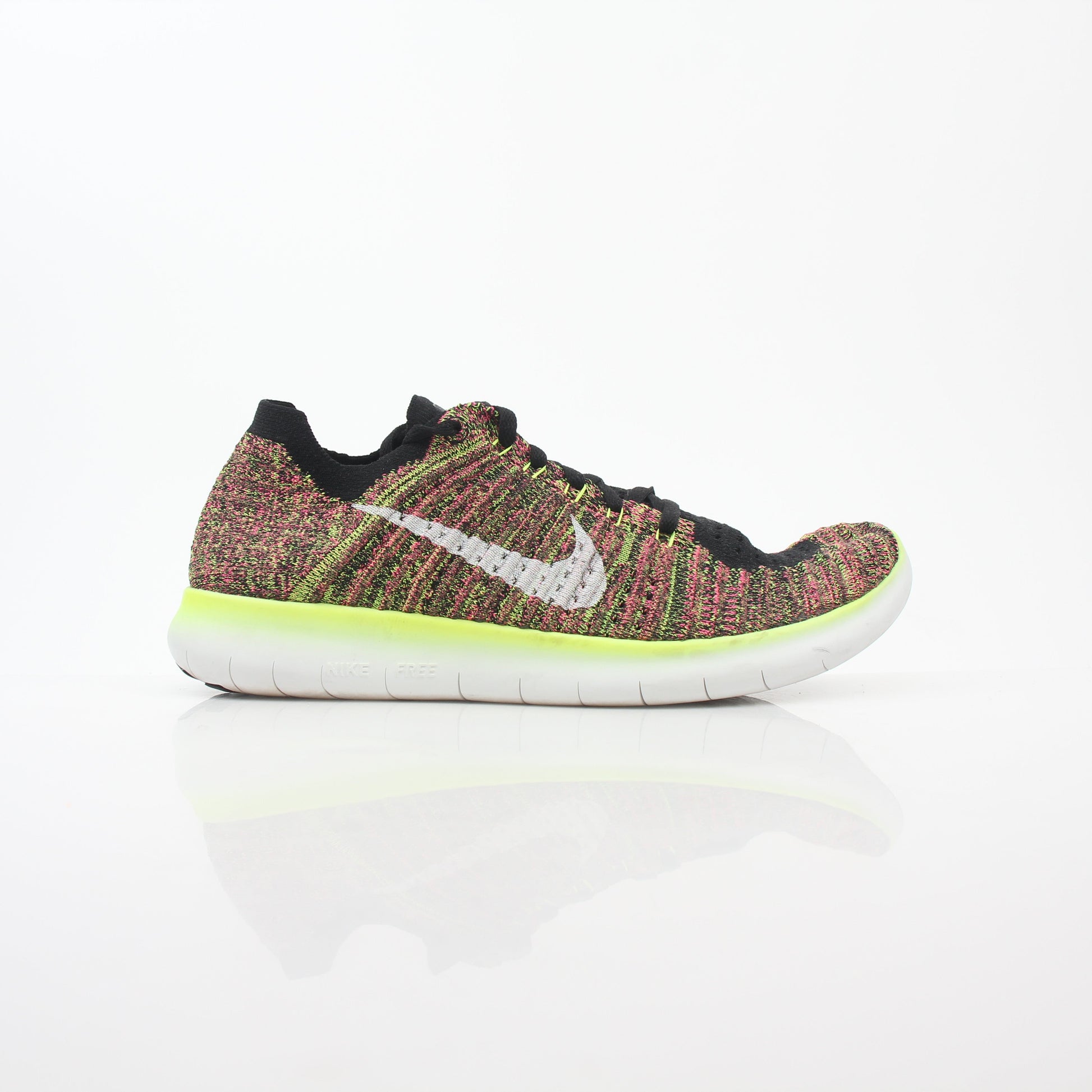 Nike Free RN Flyknit Unlimited Olympic multicolor sneakers for men, showing lightweight knit upper and athletic shoe design.