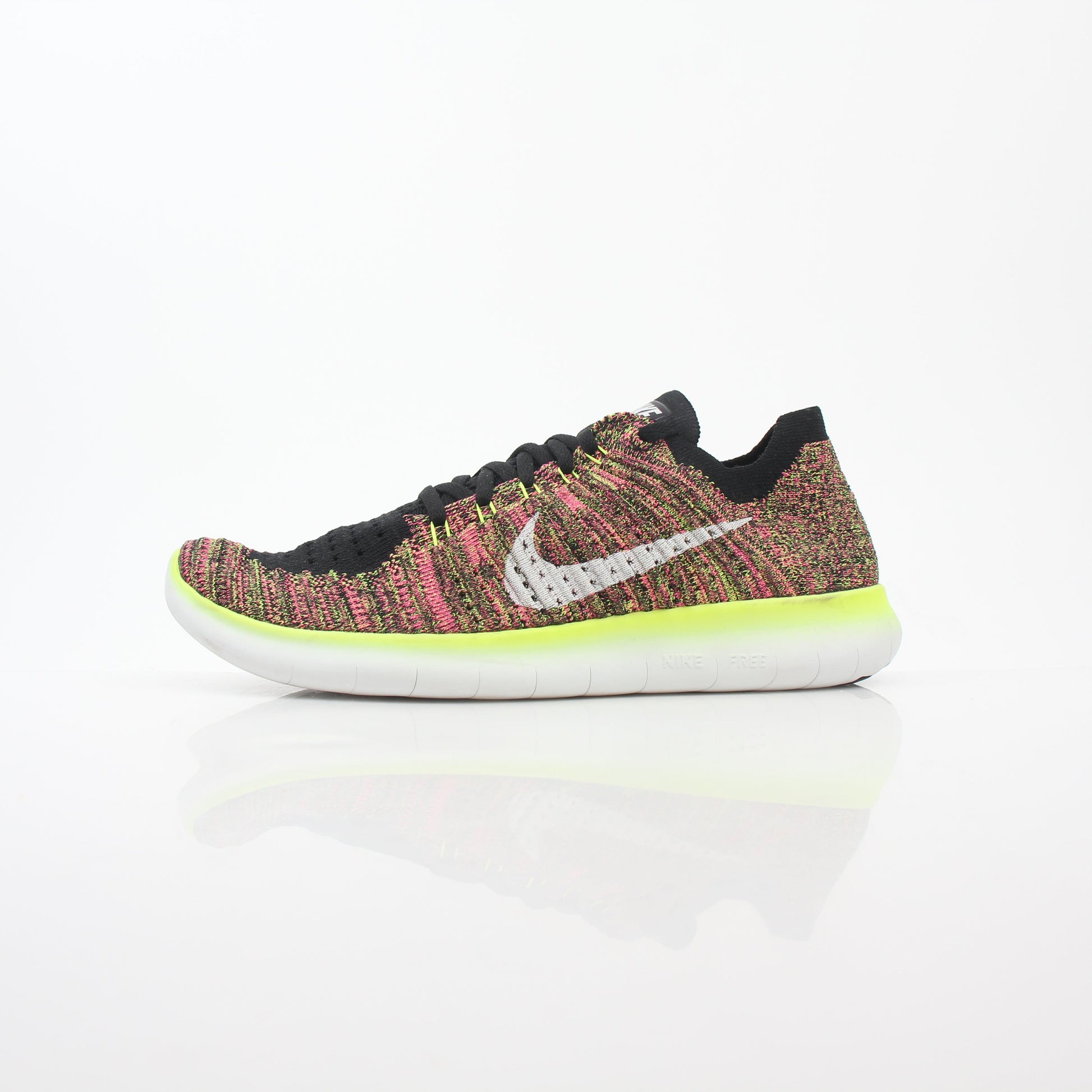 Nike Free RN Flyknit Unlimited Olympic multicolor sneakers with lightweight knit upper and athletic shoe design for active wear.