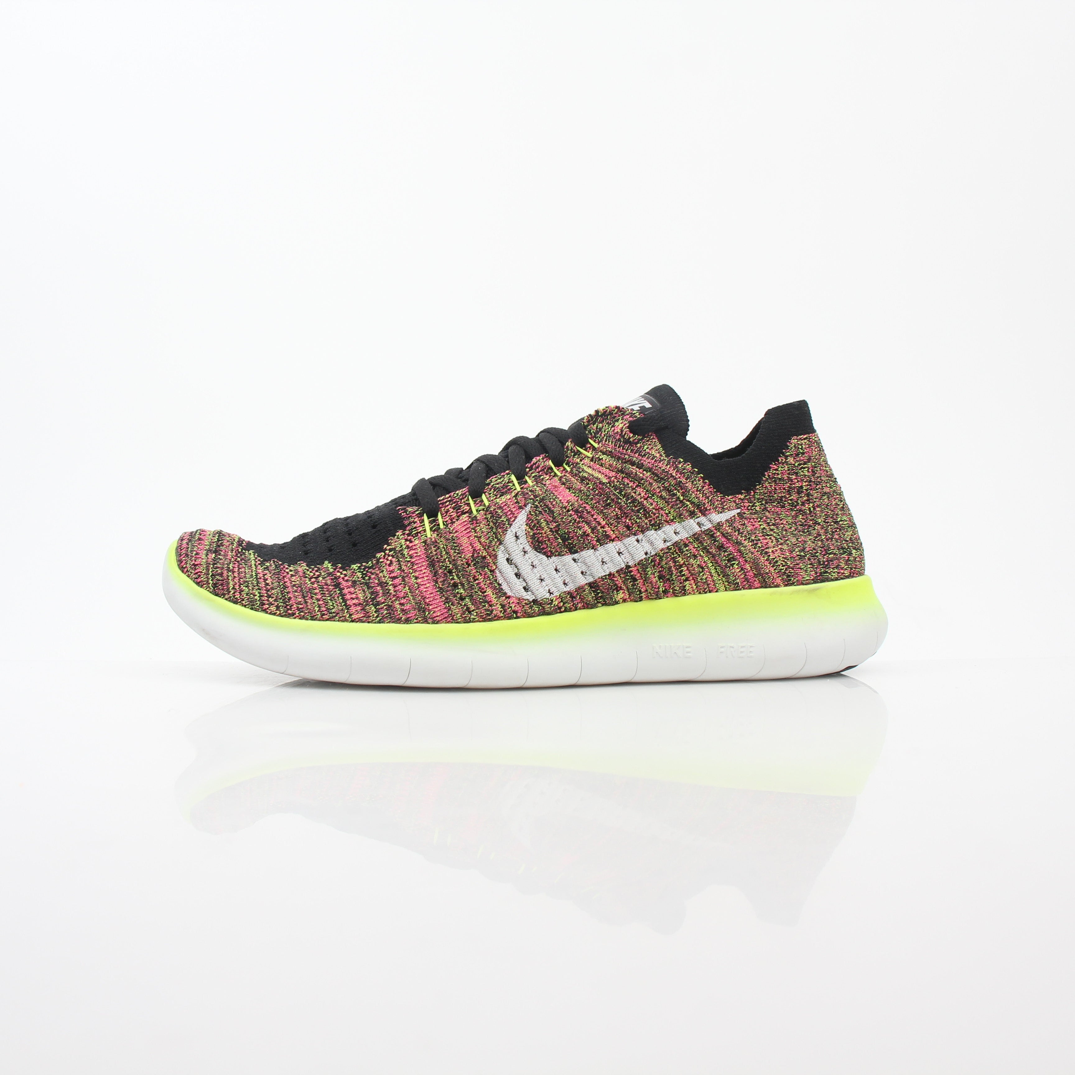 Nike Free RN Flyknit Unlimited Olympic multicolor sneakers with lightweight knit upper and athletic shoe design for active wear.