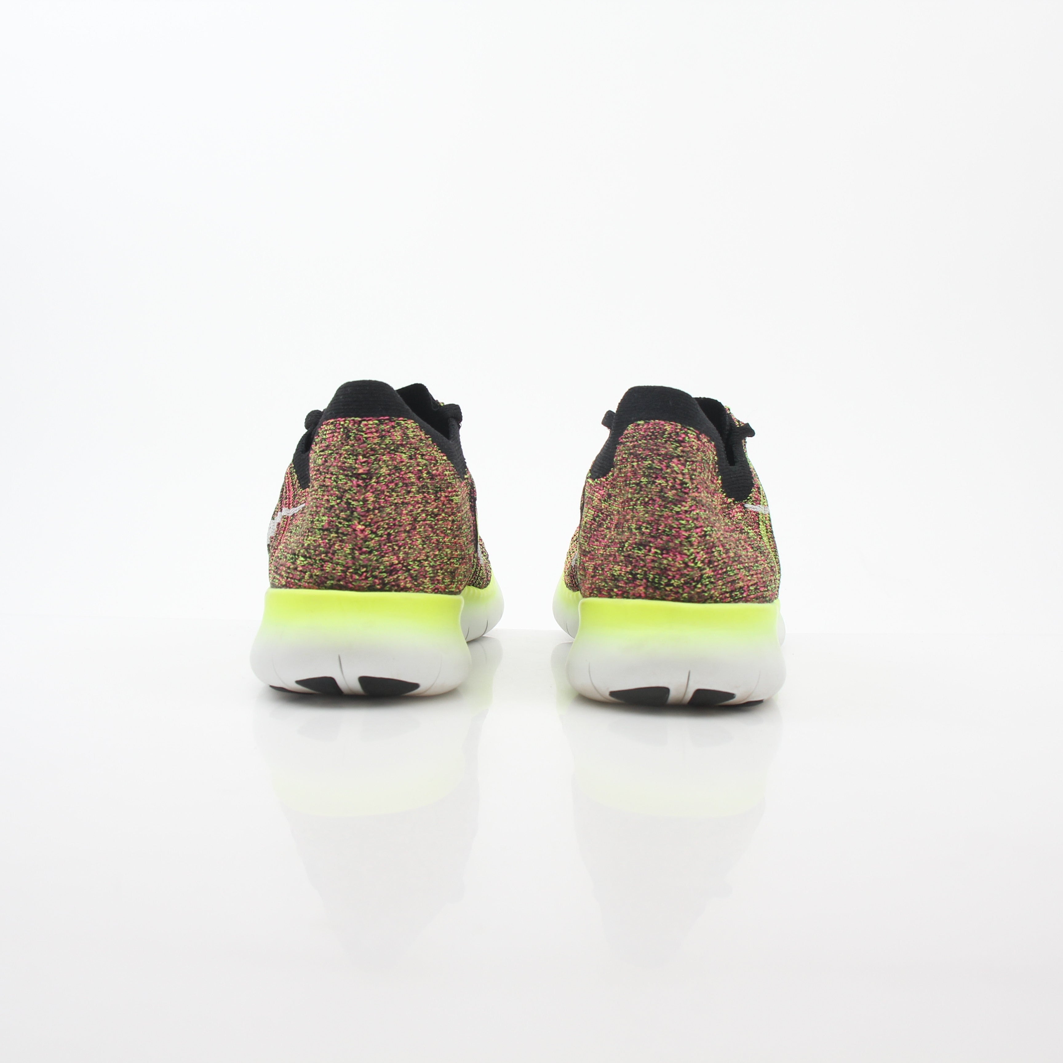 Nike Free RN Flyknit Unlimited multicolor sneakers by Gold & Beyond, featuring lightweight Flyknit upper and athletic shoe design.