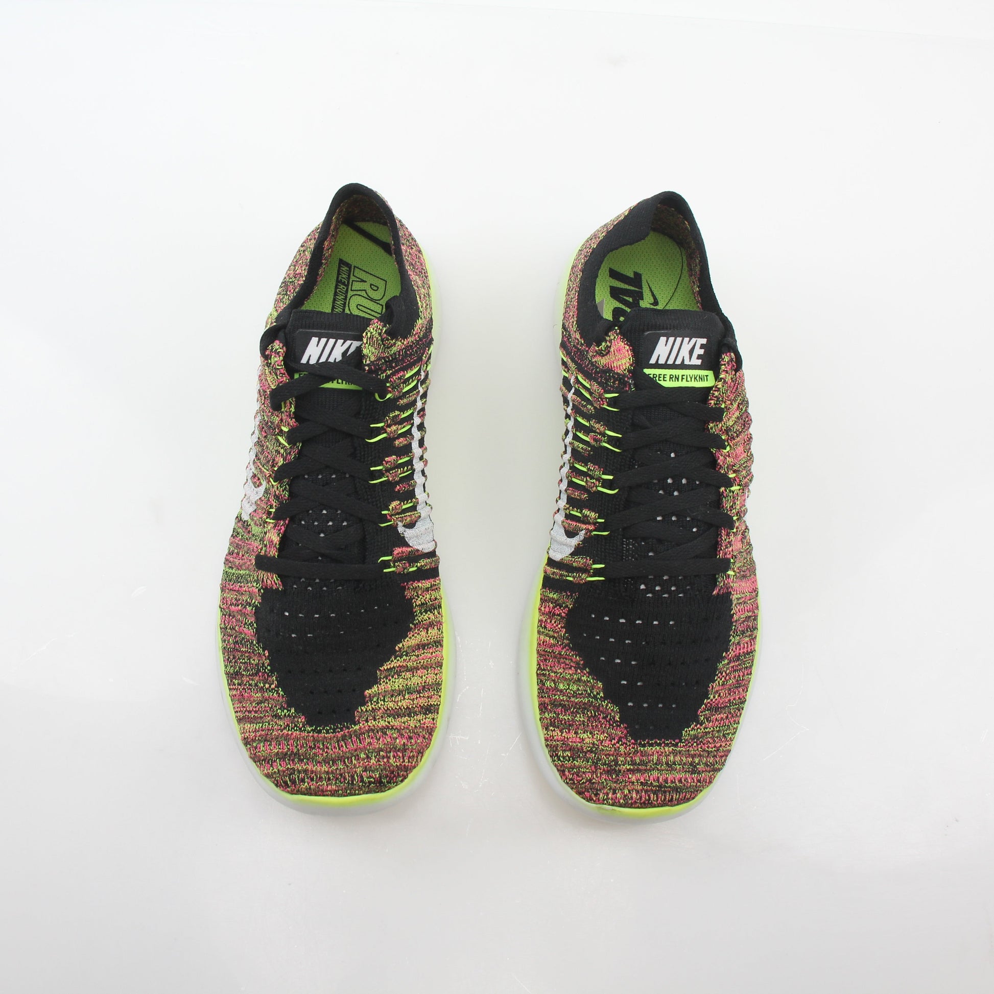 Nike Free RN Flyknit Unlimited multicolor sneakers with lightweight Flyknit upper and athletic design by Gold & Beyond.
