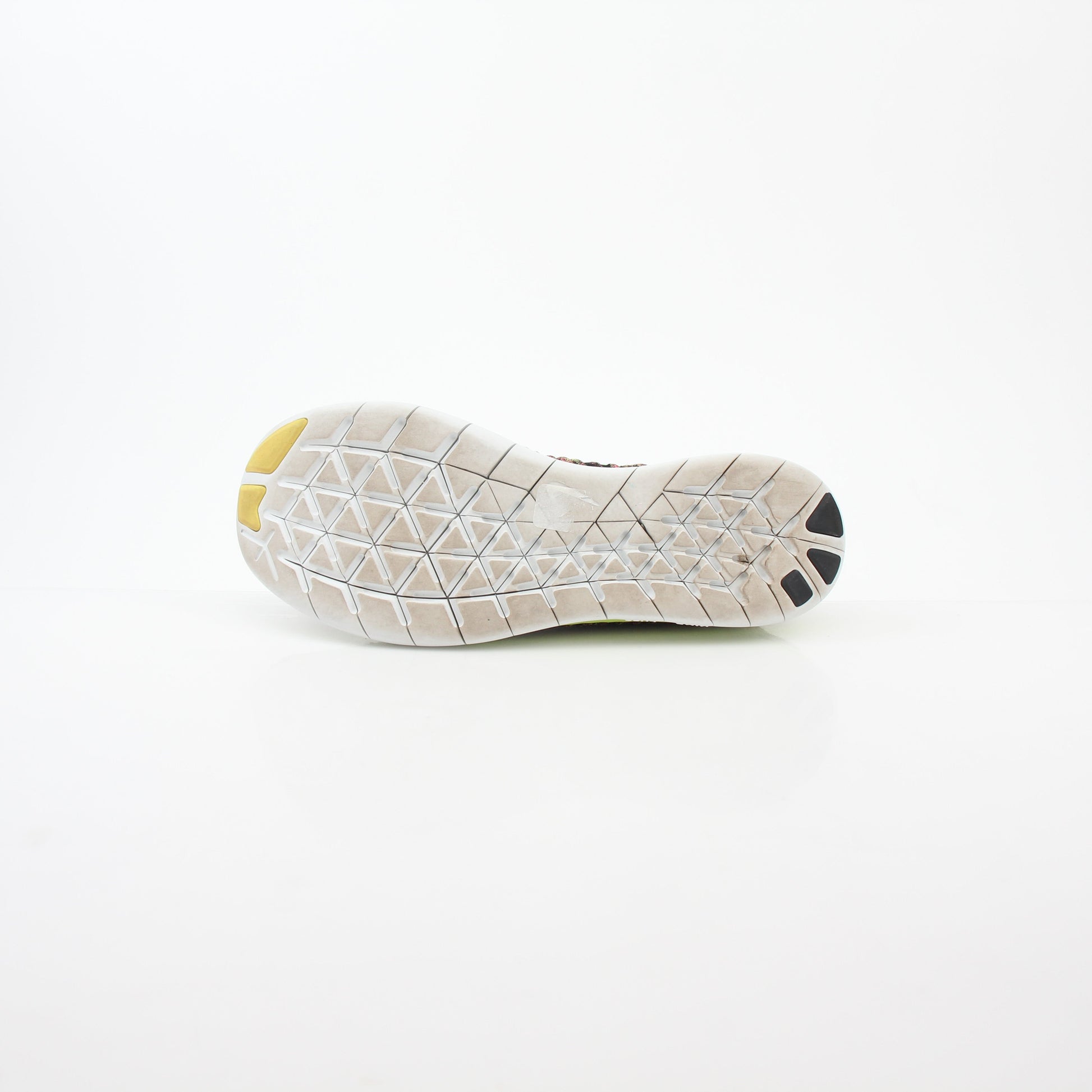 Nike Free RN Flyknit Unlimited Olympic multicolor sneakers, lightweight athletic shoes with breathable flyknit upper and flexible sole.