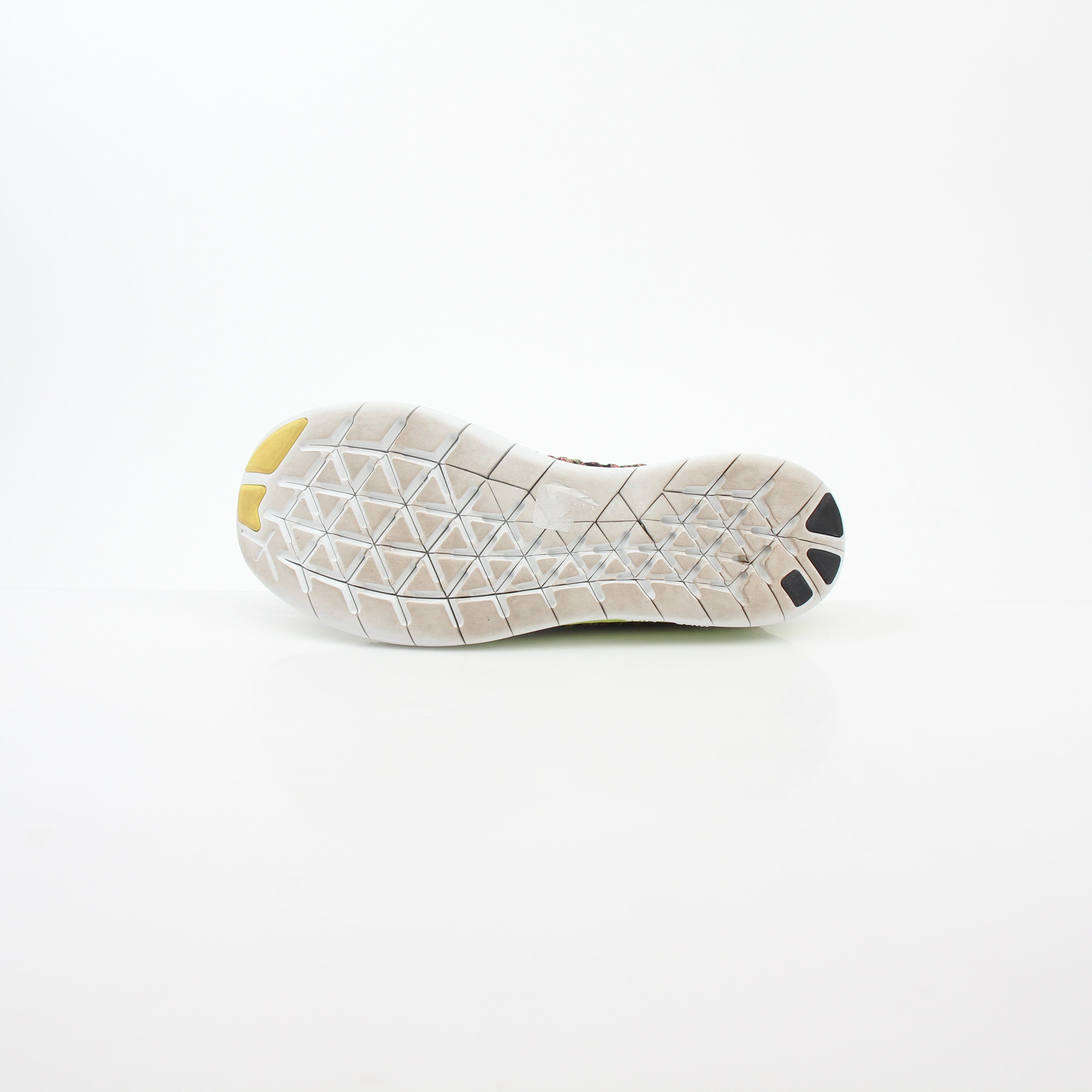 Nike Free RN Flyknit Unlimited Olympic multicolor sneakers, lightweight athletic shoes with breathable flyknit upper and flexible sole.