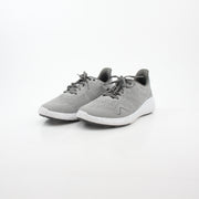 Gray FootJoy Flex Spikeless Golf Shoes with sleek design and comfortable fit, shown on a clean background.