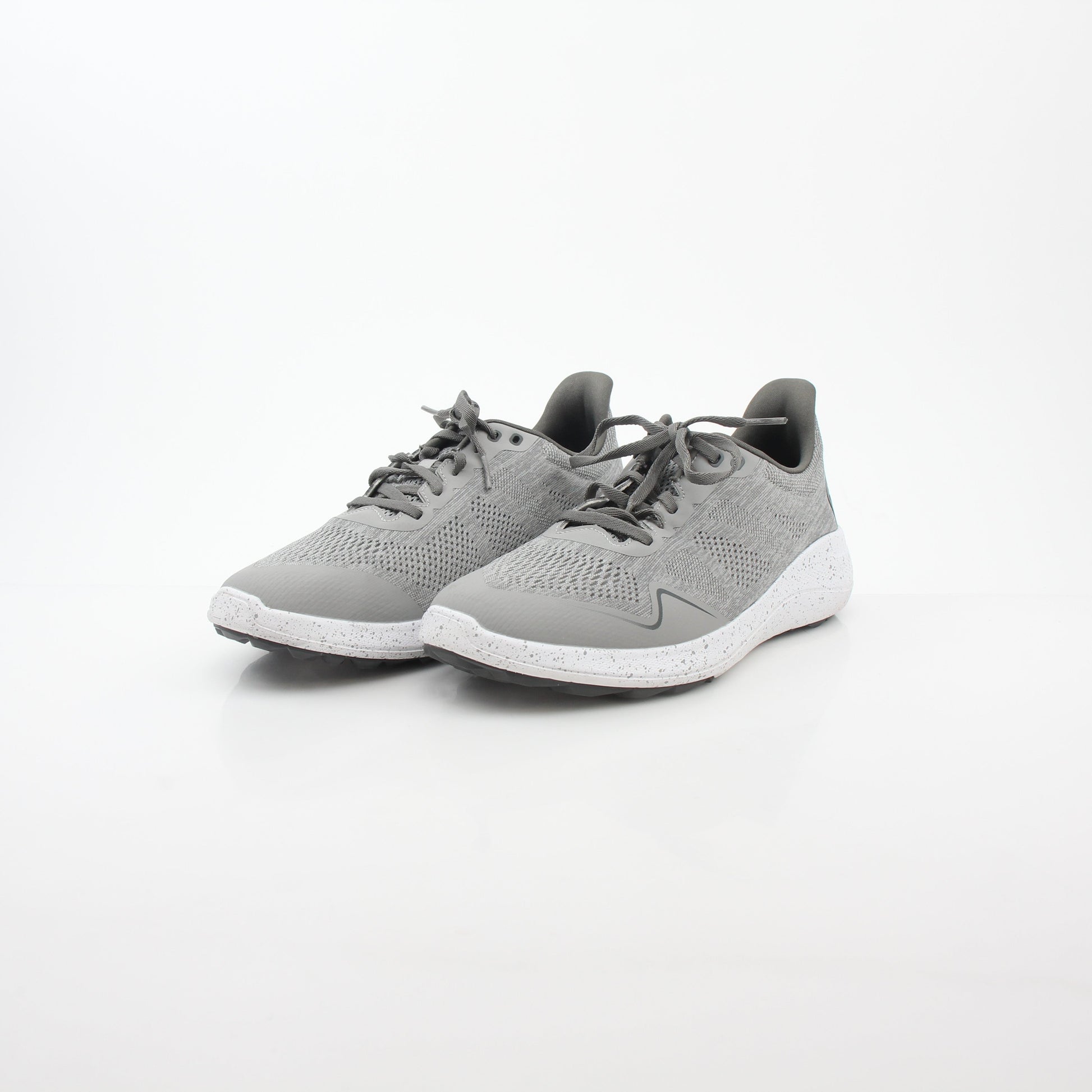 Gray FootJoy Flex Spikeless Golf Shoes with sleek design and comfortable fit, shown on a clean background.