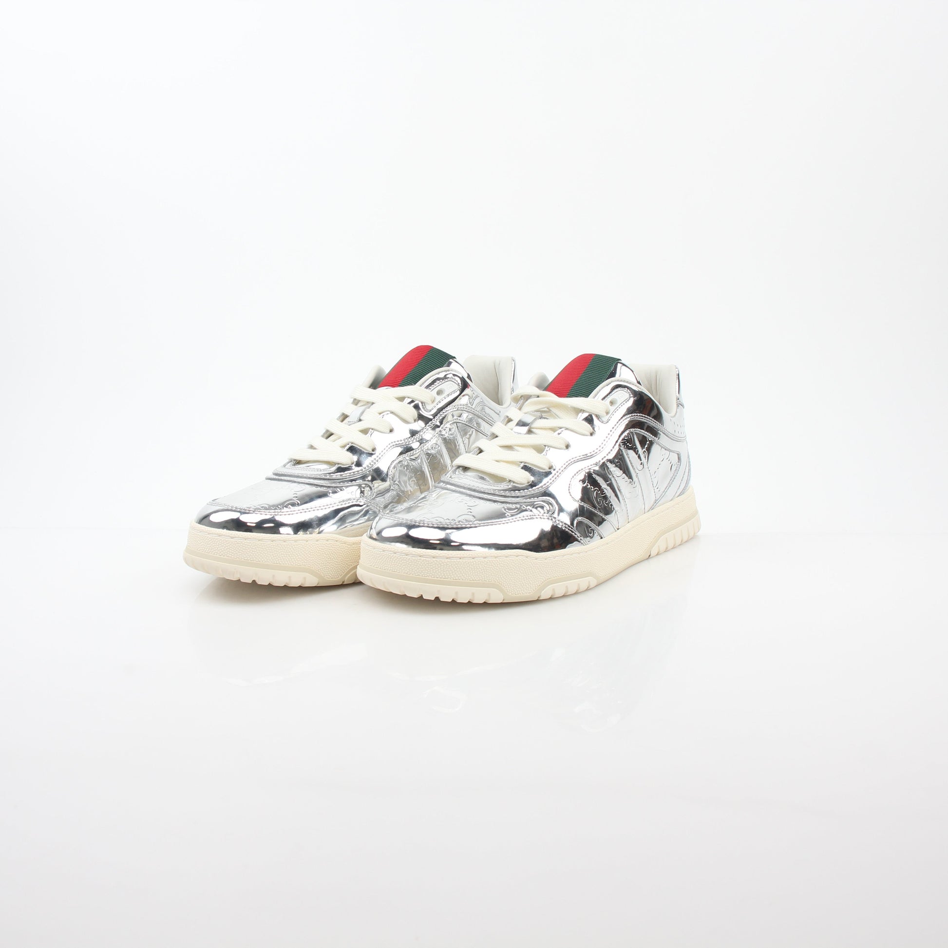 Gucci Silver Metallic Re-Web Sneakers, stylish shoes with silver metallic finish and iconic web details from Gold & Beyond.