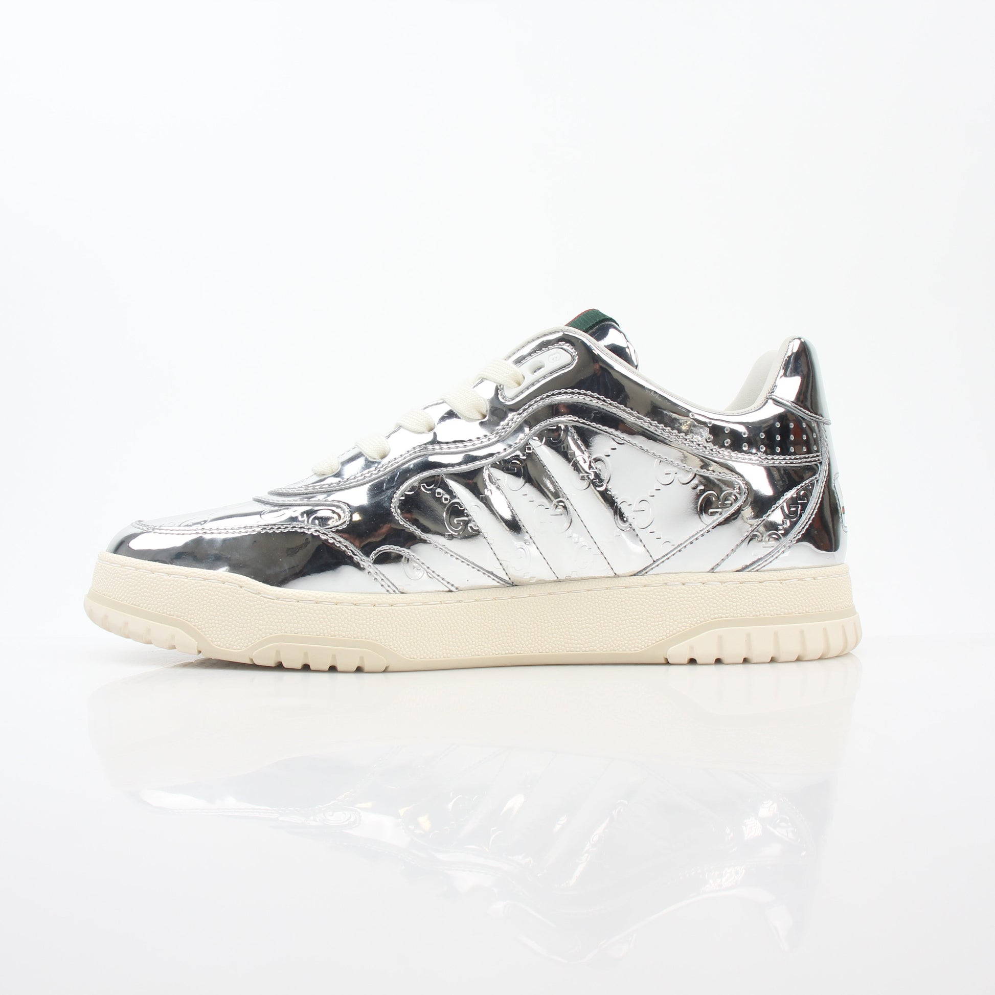 Gucci Silver Metallic Re-Web Sneakers, stylish shoes with silver metallic finish and signature web detailing, by Gold & Beyond.
