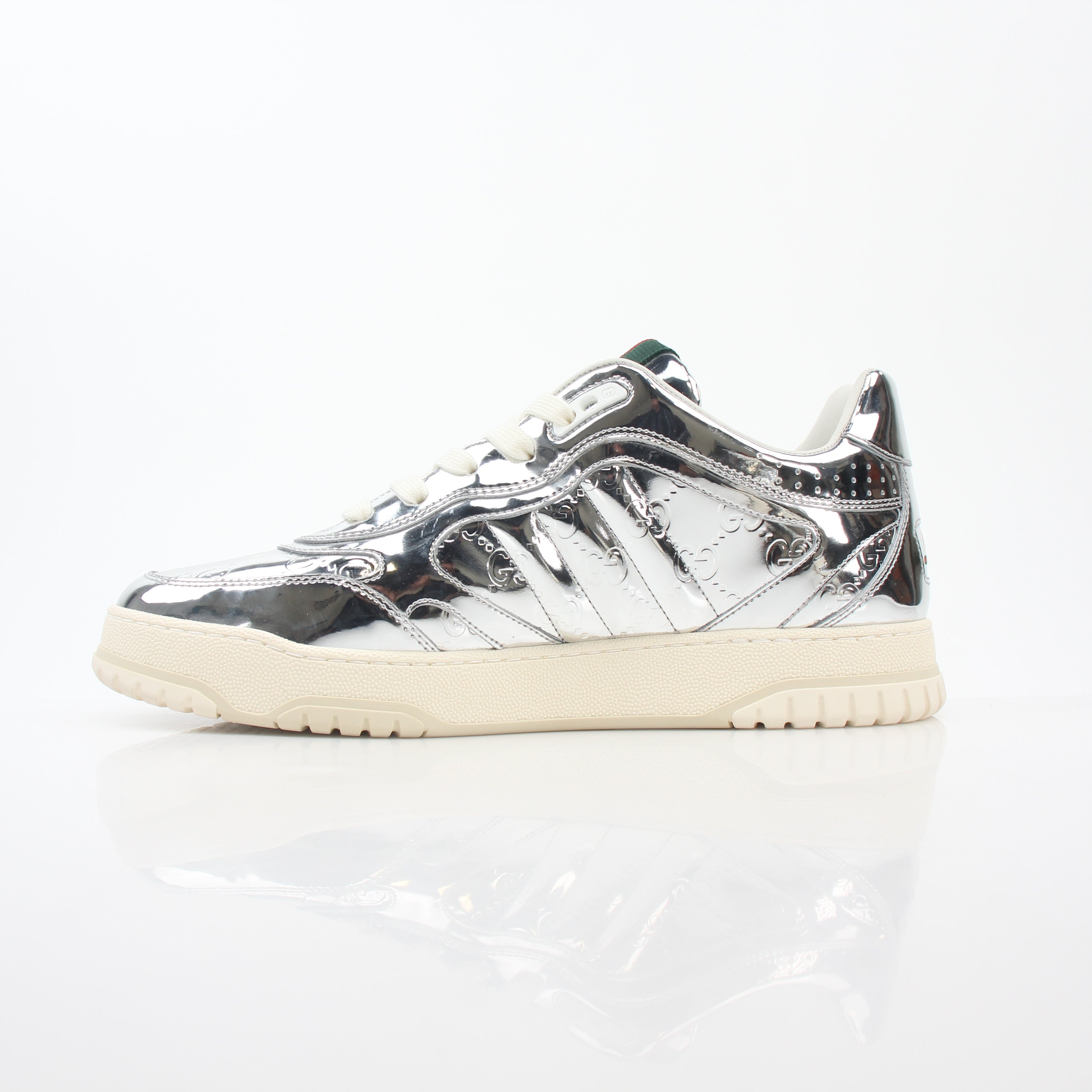 Gucci Silver Metallic Re-Web Sneakers, stylish shoes with silver metallic finish and signature web detailing, by Gold & Beyond.