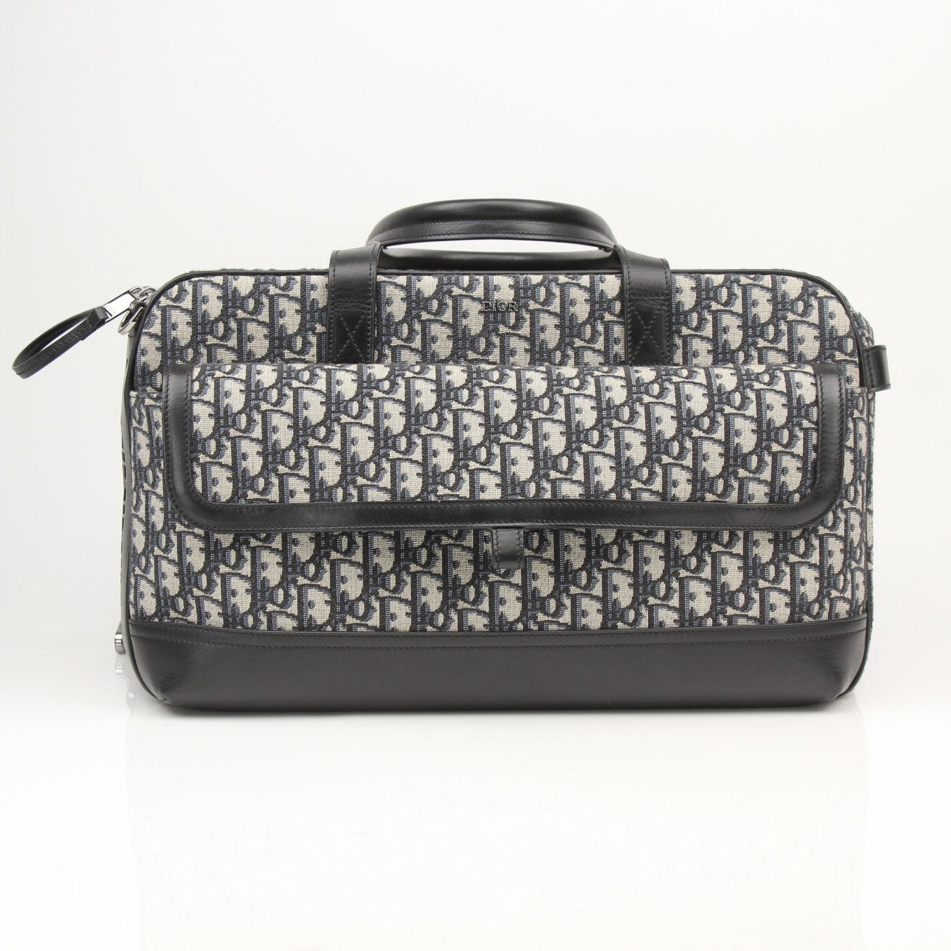 Christian Dior Oblique dog carrier travel bag with adjustable strap and top zipper closure, designed for stylish pet travel.