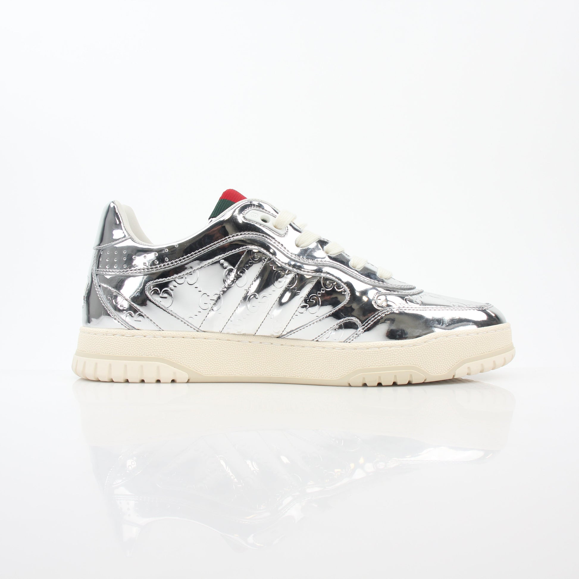 Gucci Silver Metallic Re-Web Sneakers, stylish shoes with metallic silver finish and signature web design, on a clean background.