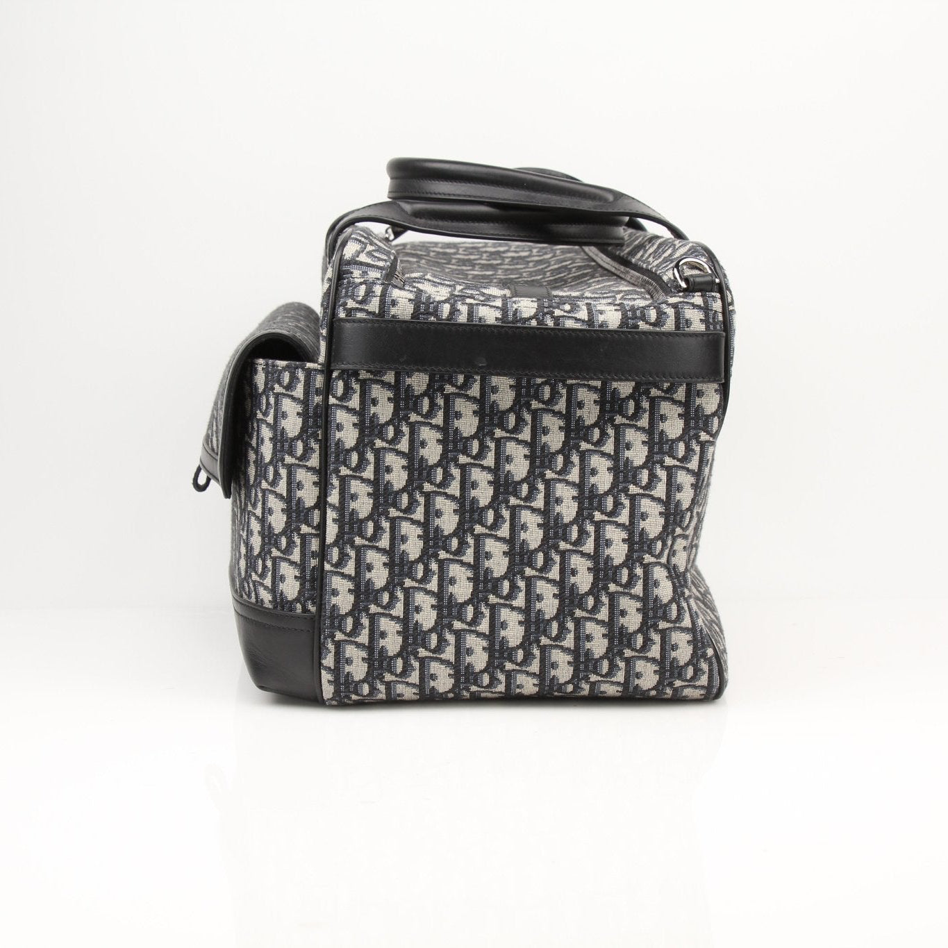 Christian Dior Oblique dog carrier travel bag by Gold & Beyond, featuring the signature pattern and a comfortable, stylish design.